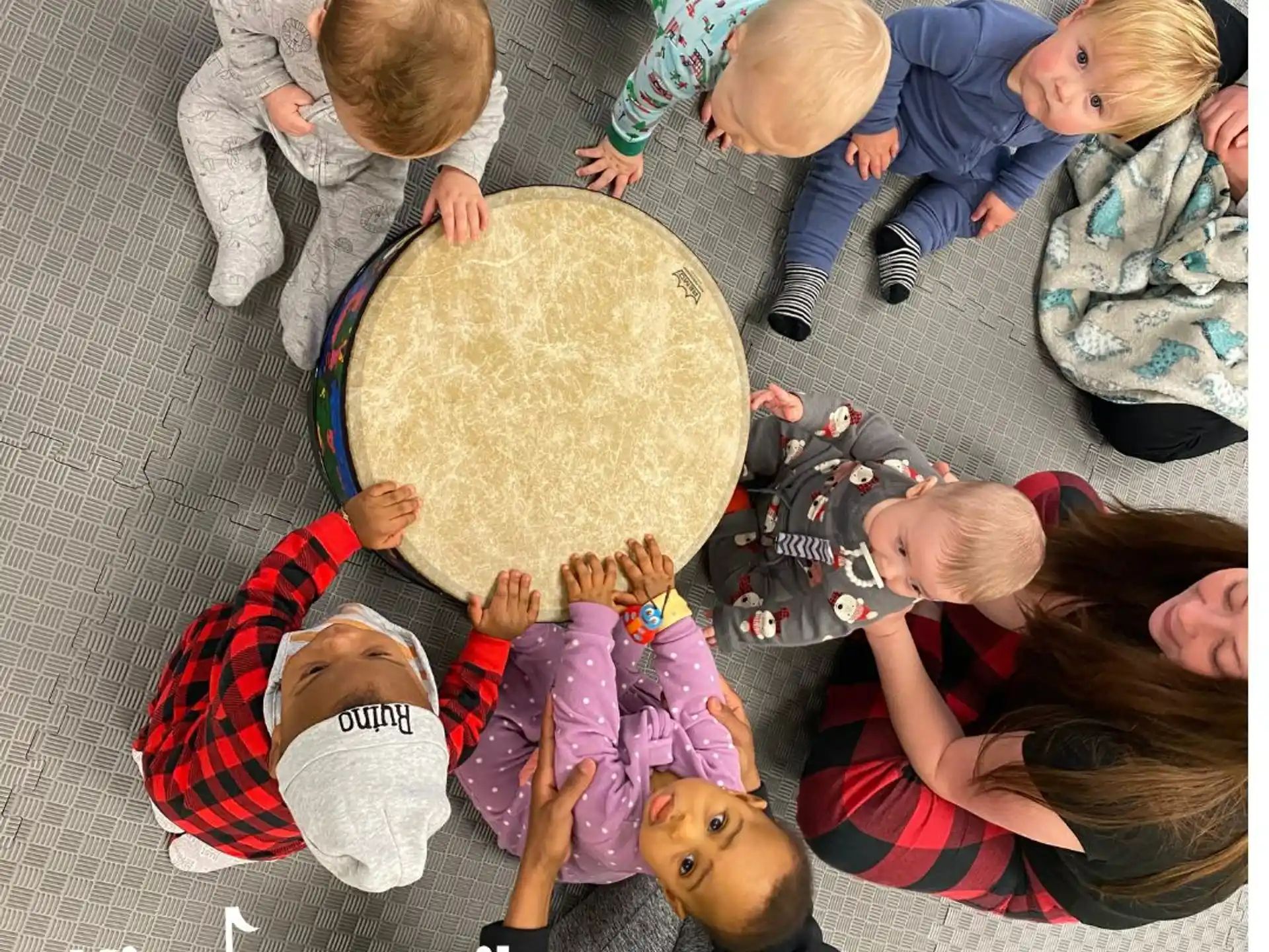 a group of children playing with a toy