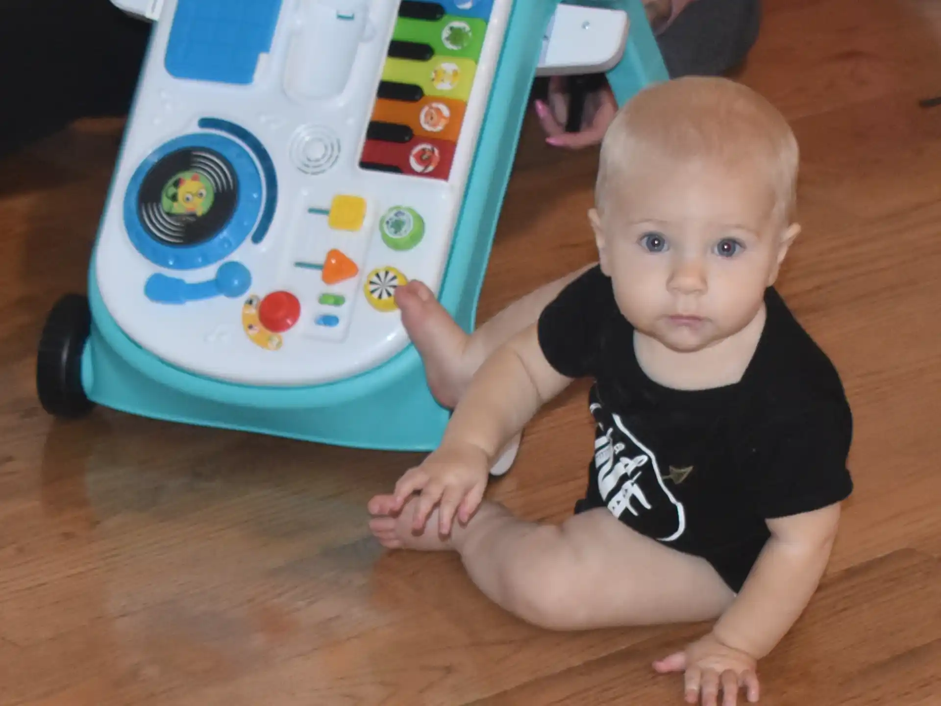 a baby playing with a toy
