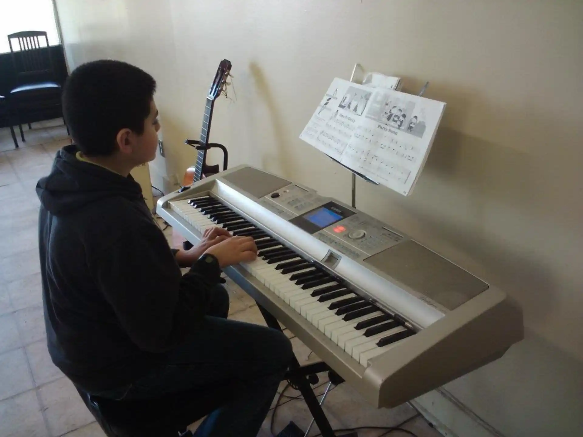 a person playing a piano
