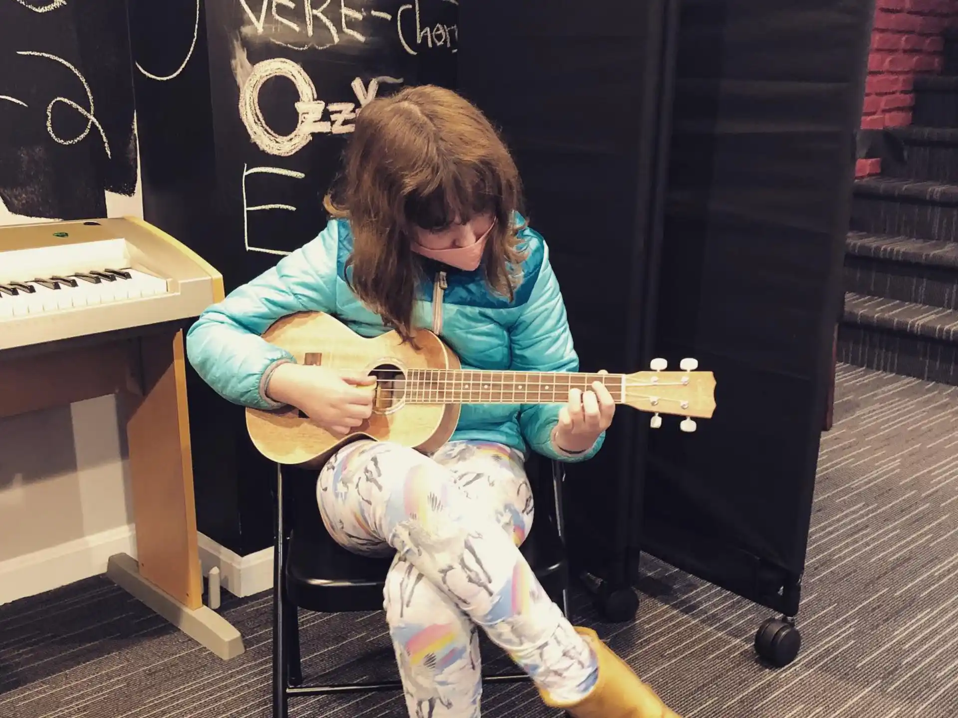 a person playing a guitar