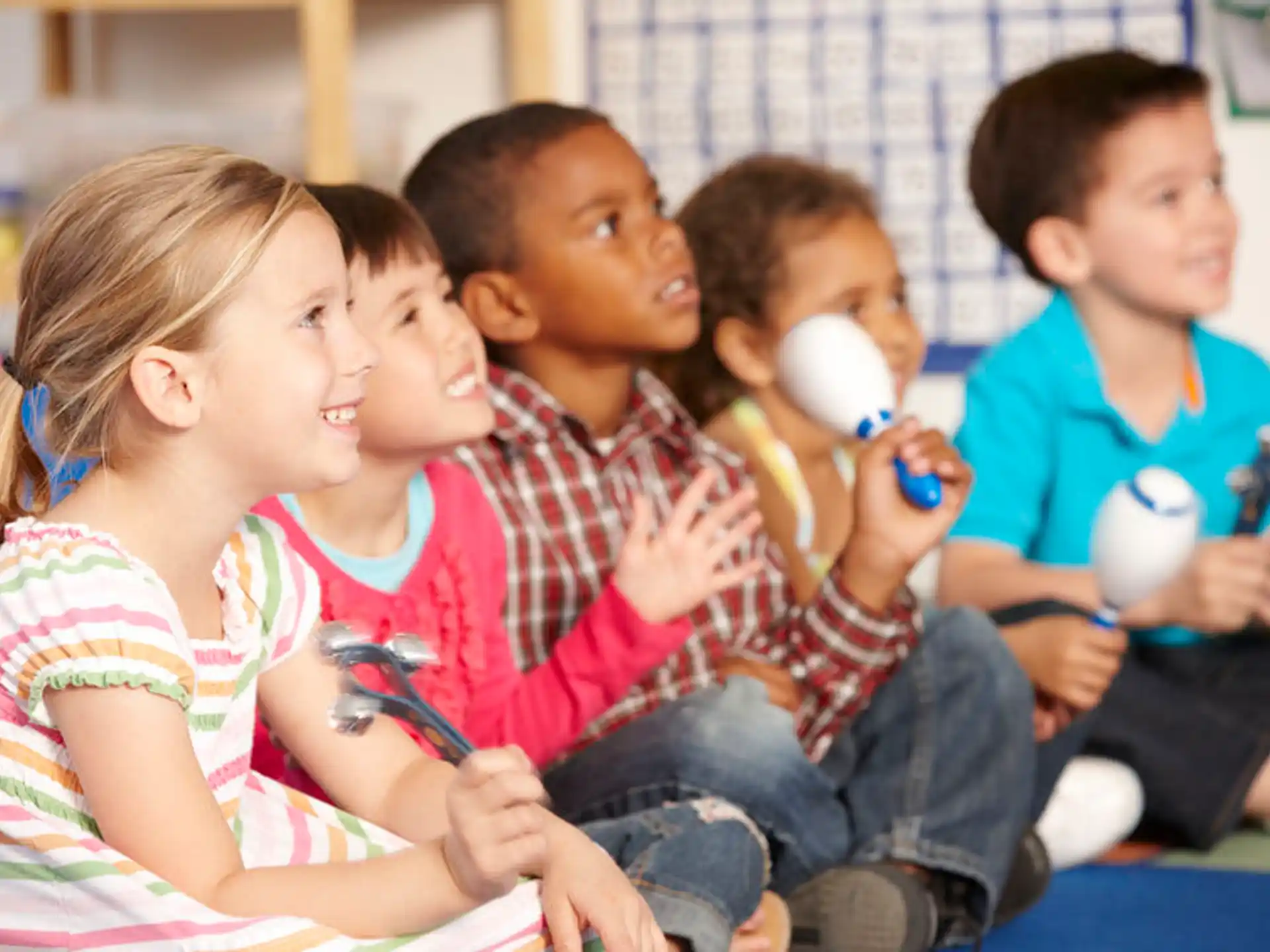a group of children playing with a toy