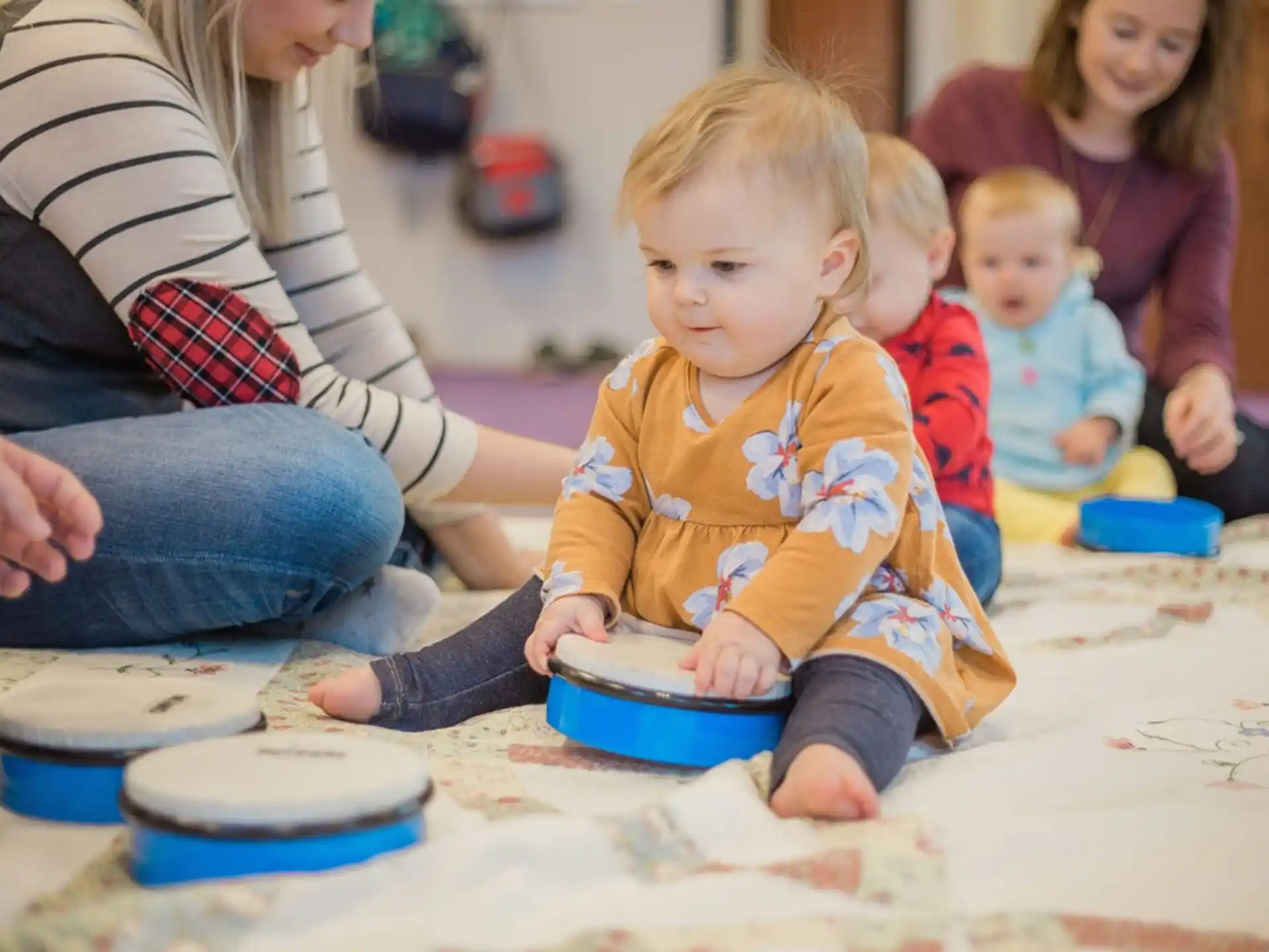 a group of children playing with toys
