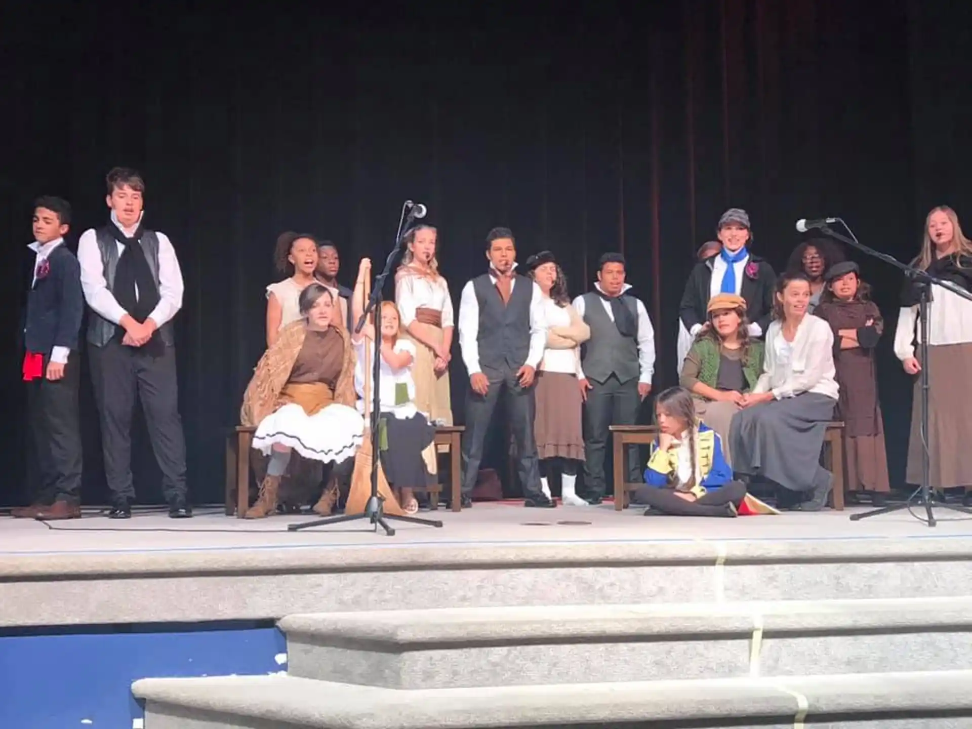 a group of people on stage