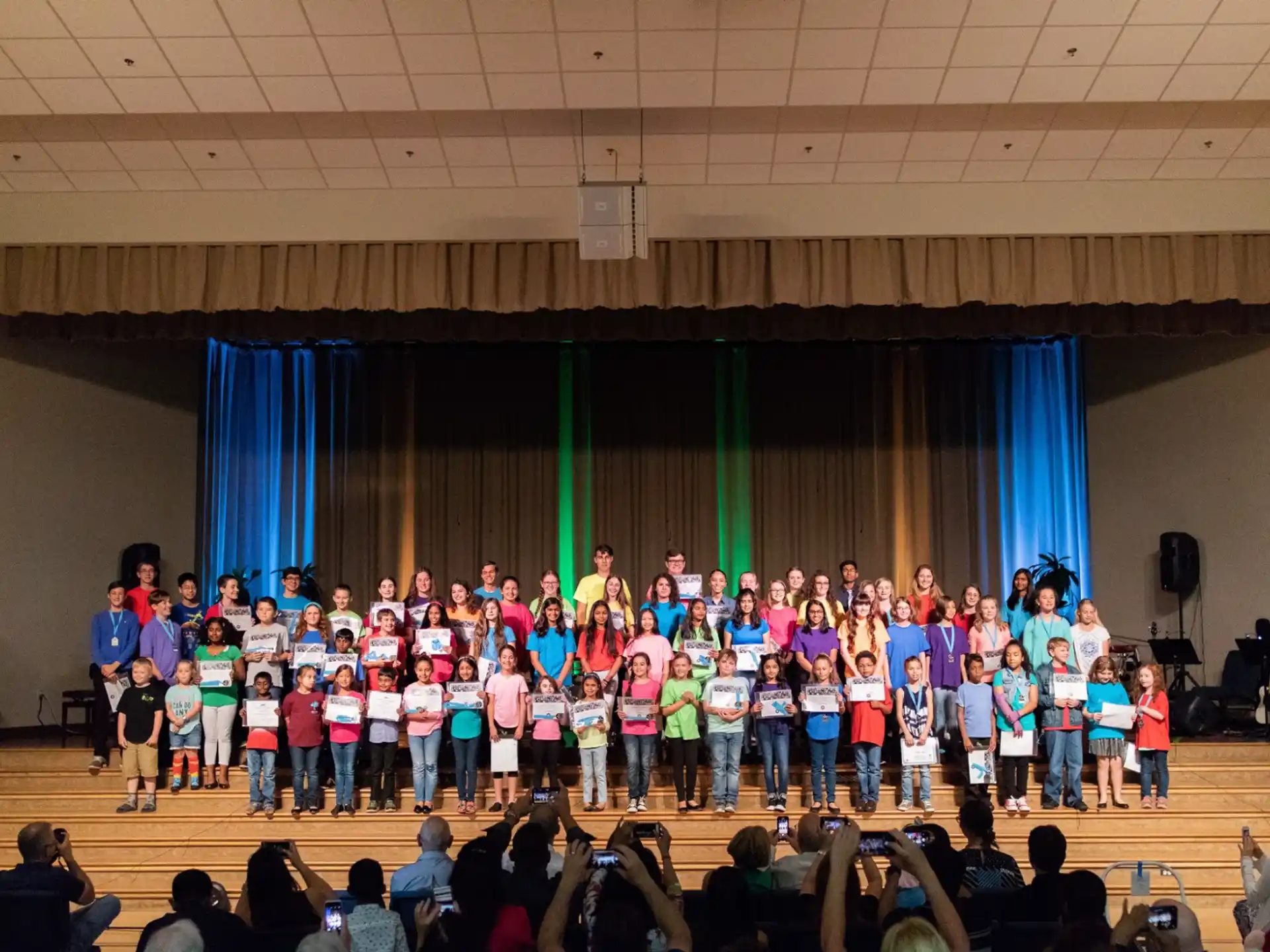 a group of children posing for a photo