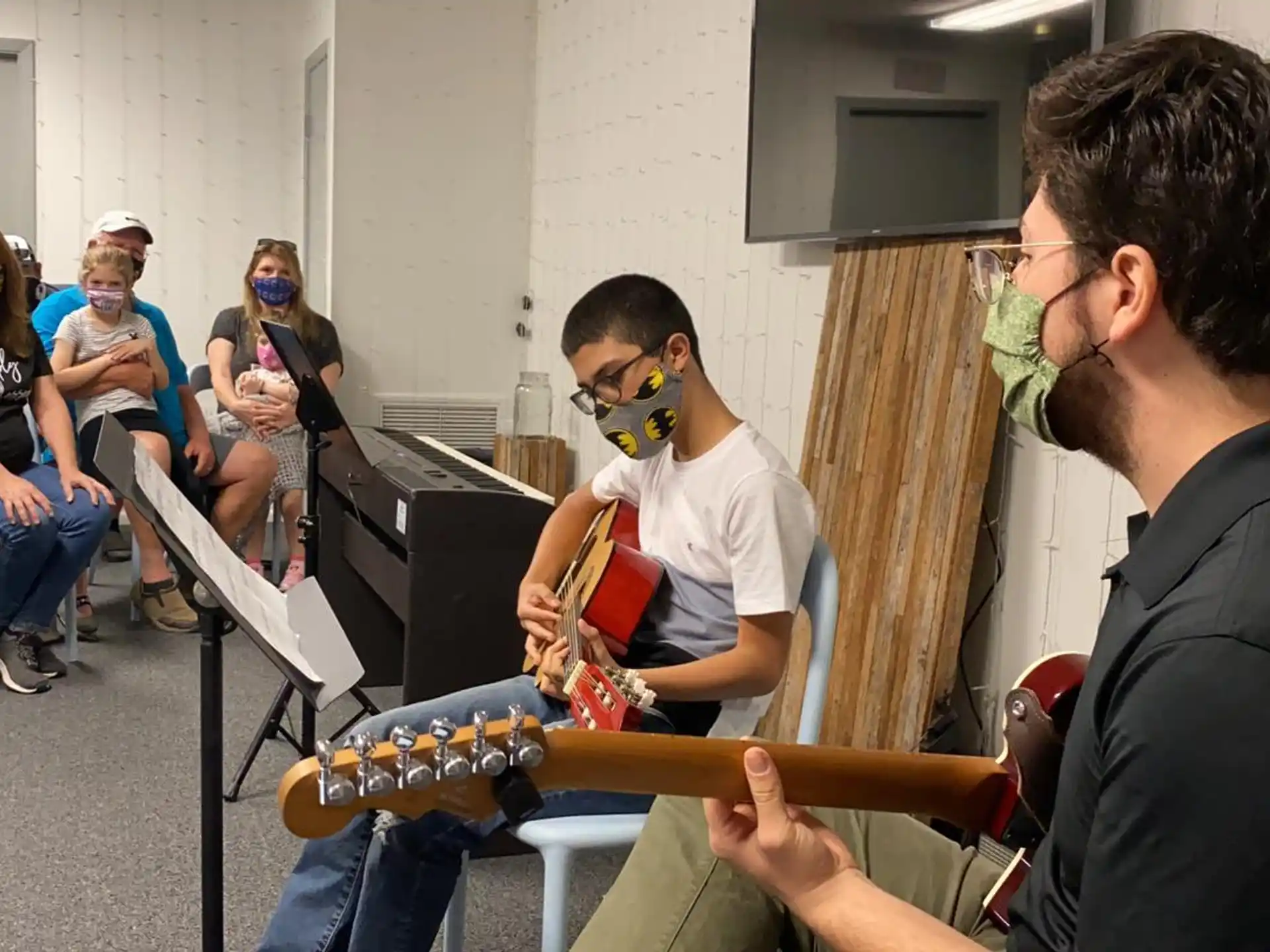a group of people playing instruments