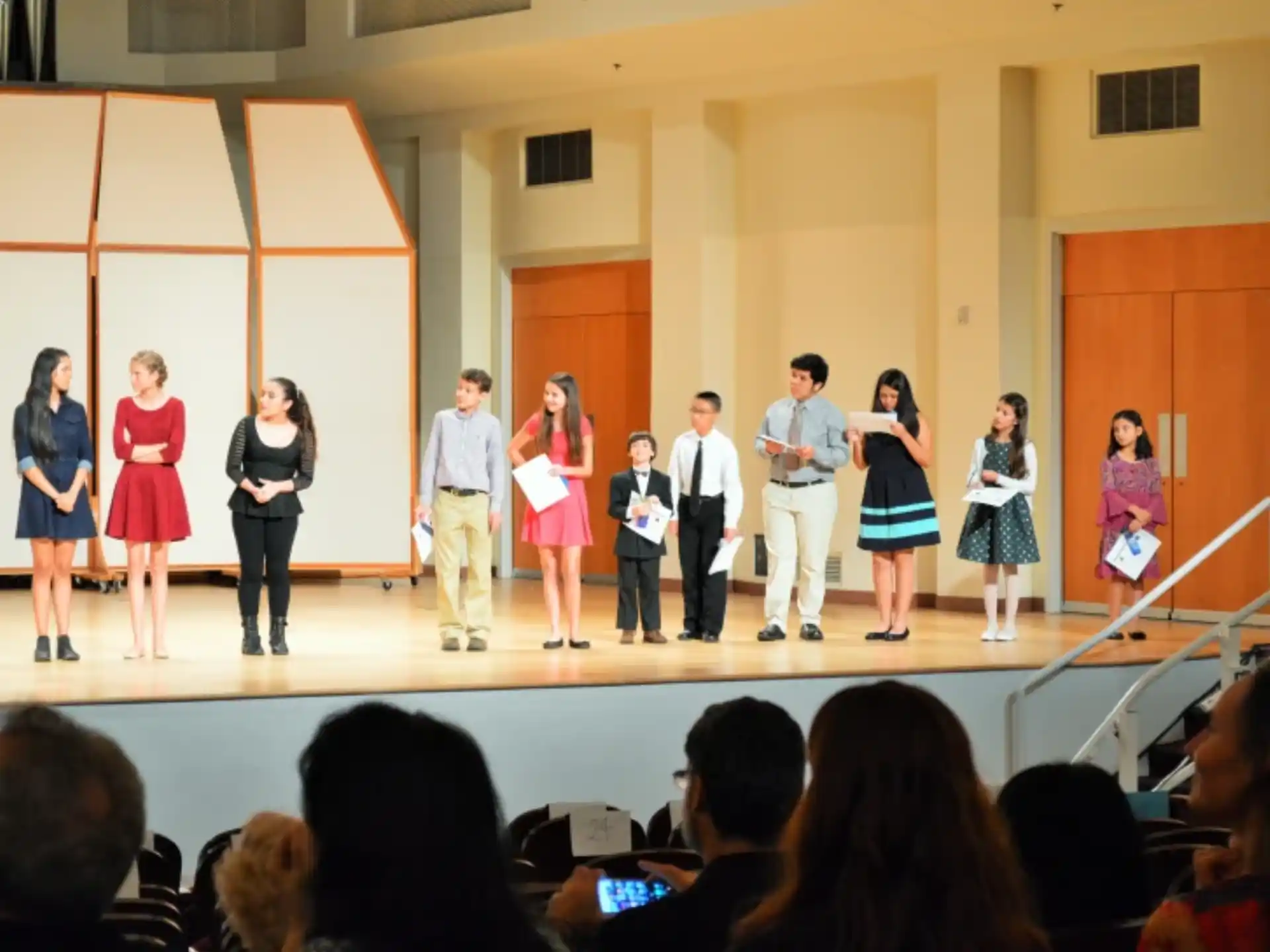 a group of people on a stage
