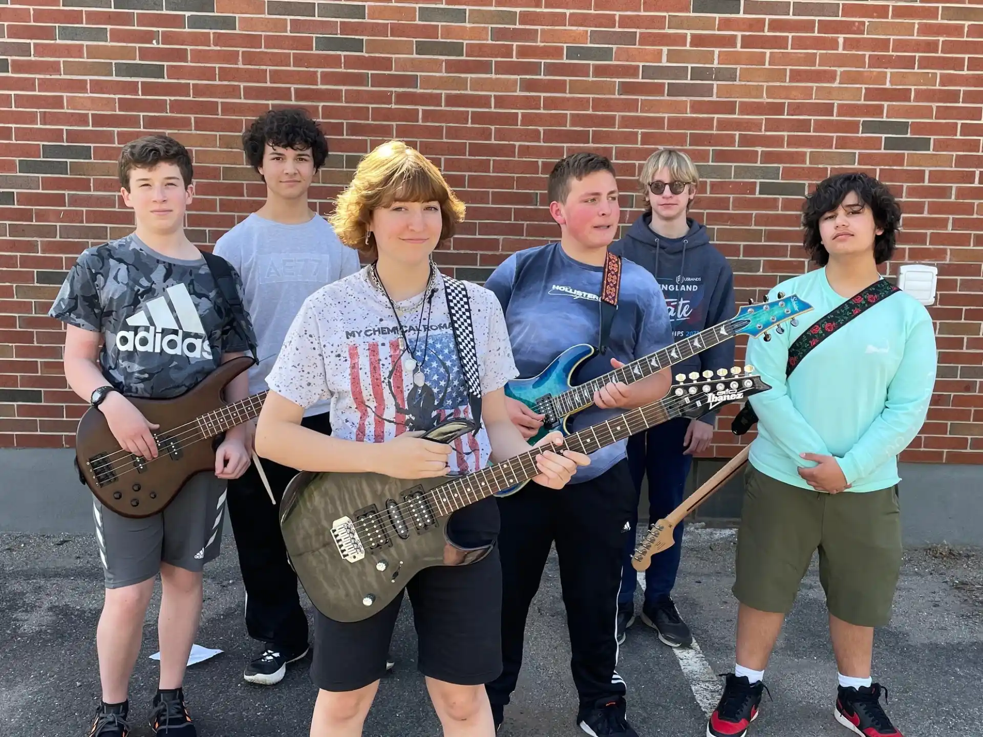 a group of people holding instruments