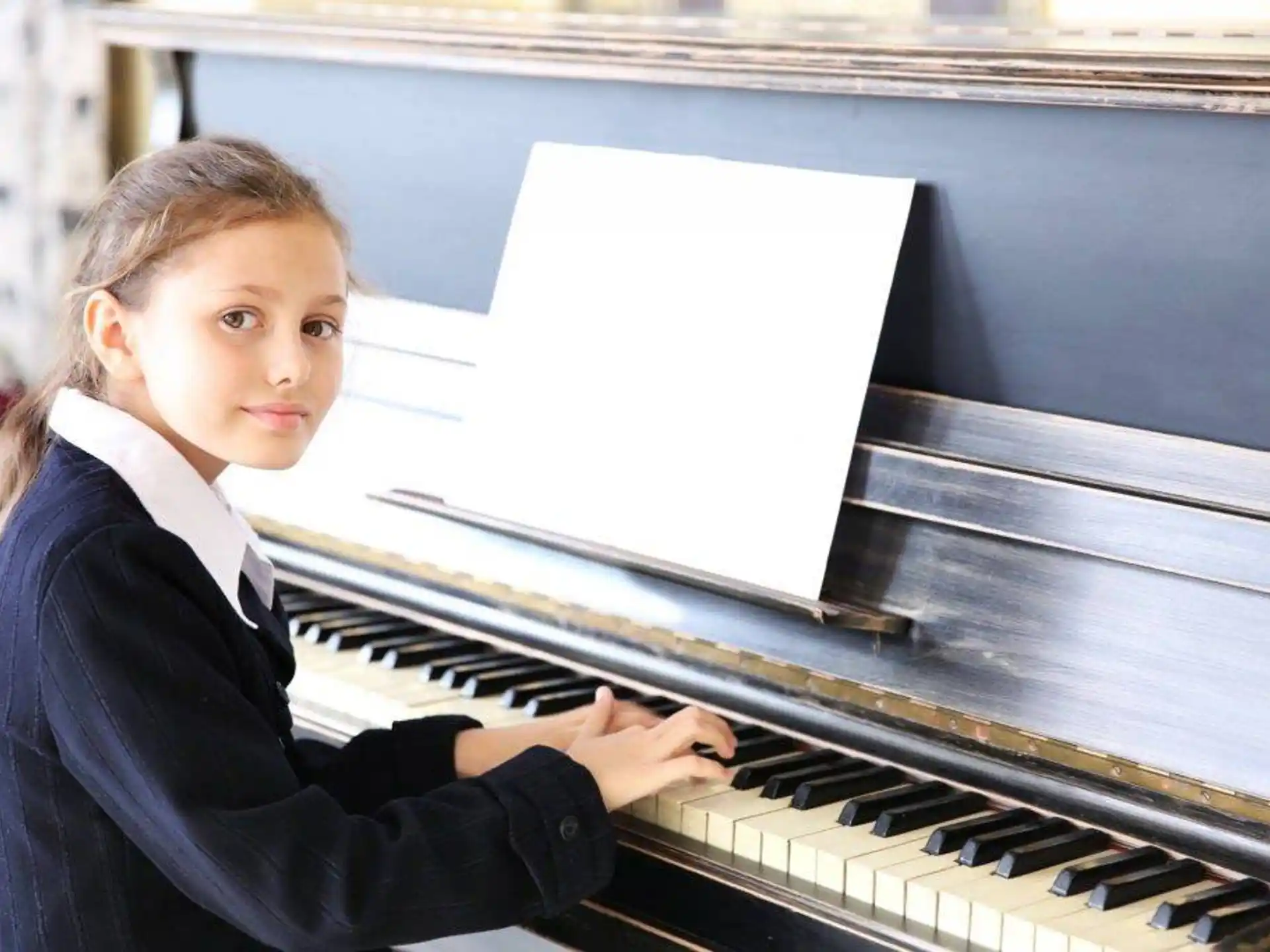 a person playing a piano