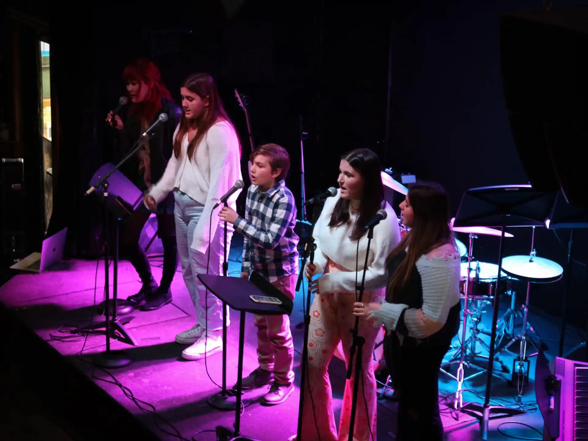 a group of people on a stage