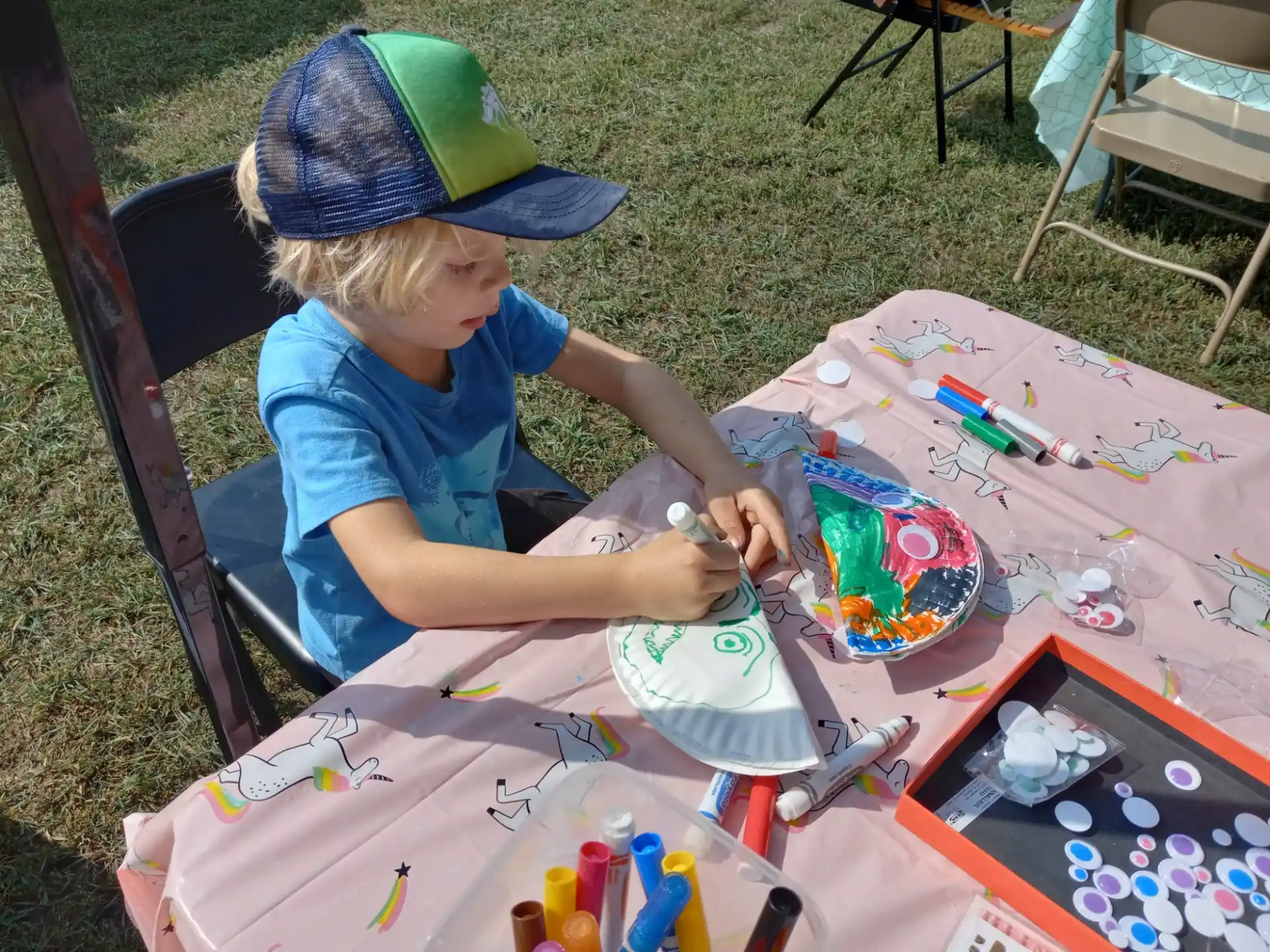 a child painting on a table
