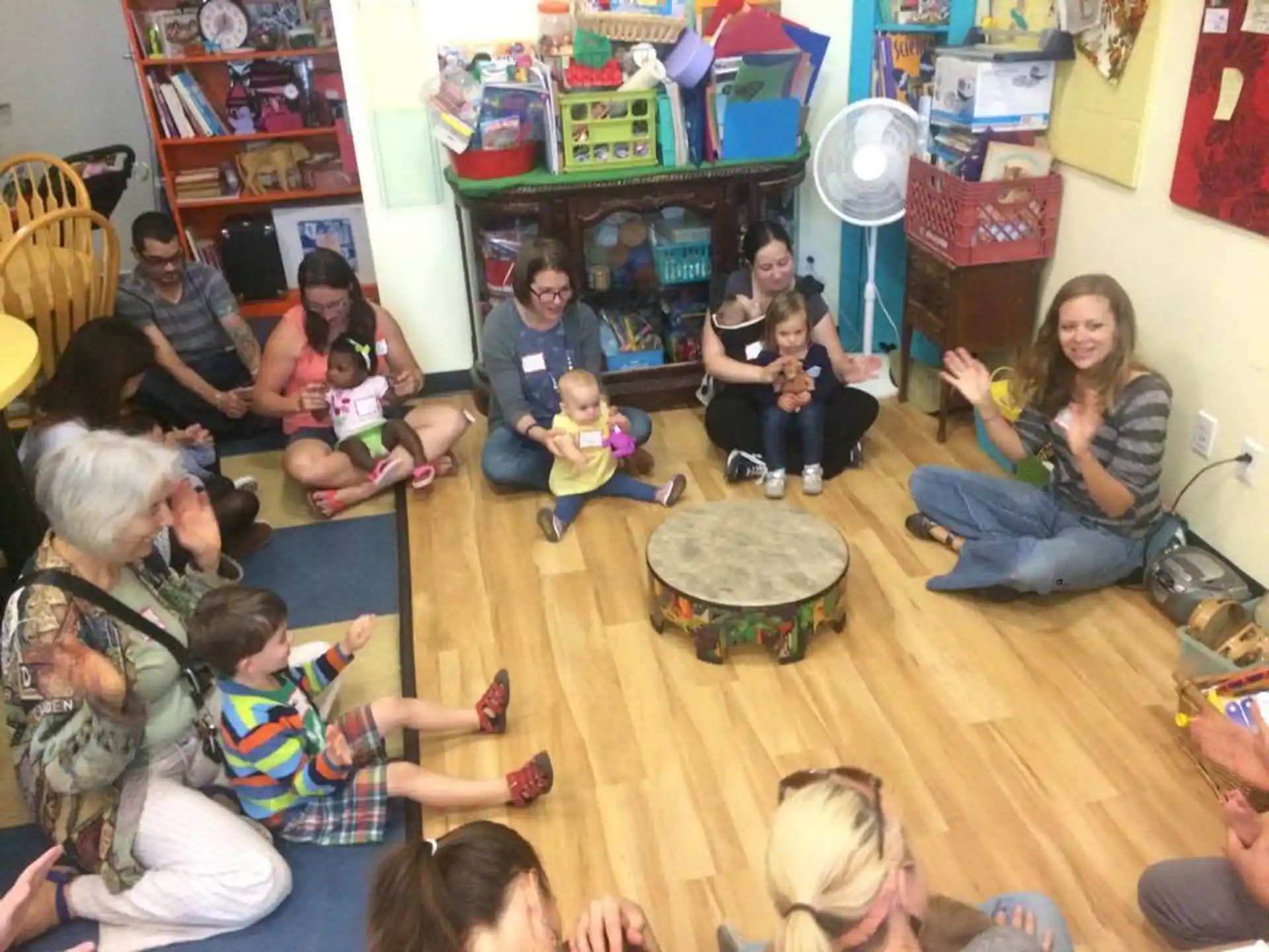a group of people sitting on the floor