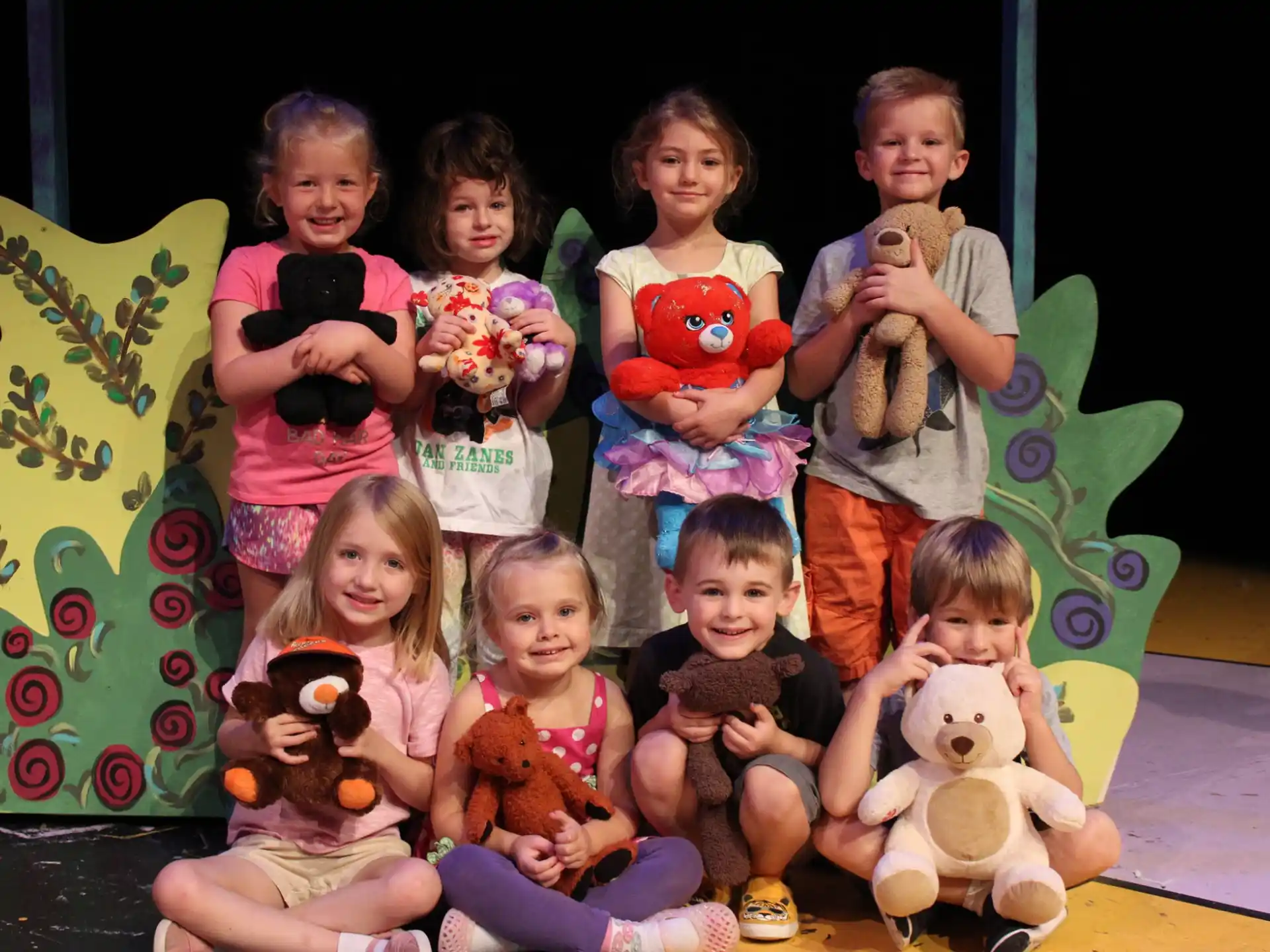 a group of children posing for a photo