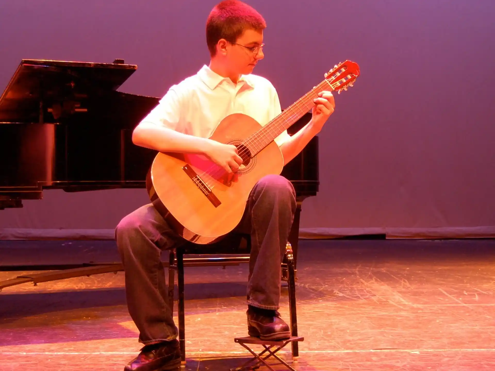 a man playing a guitar