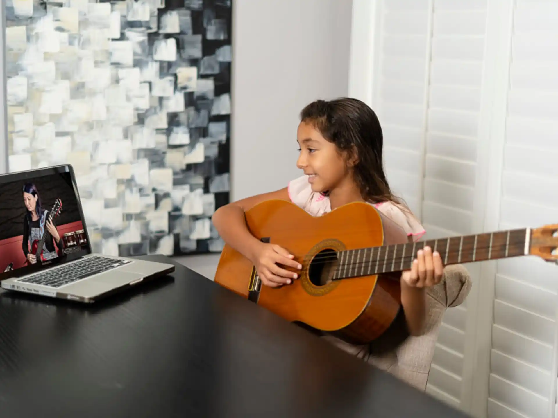a person playing a guitar