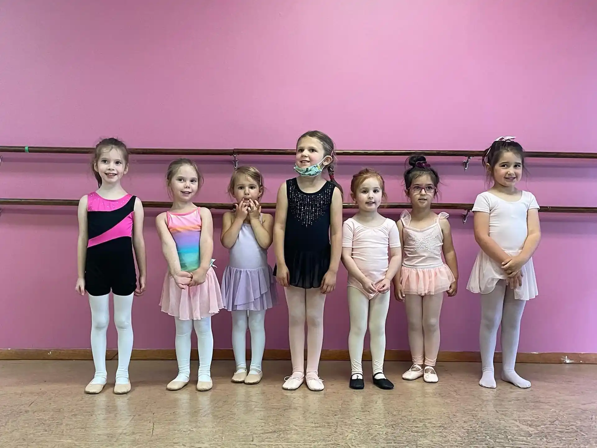a group of girls posing for a photo