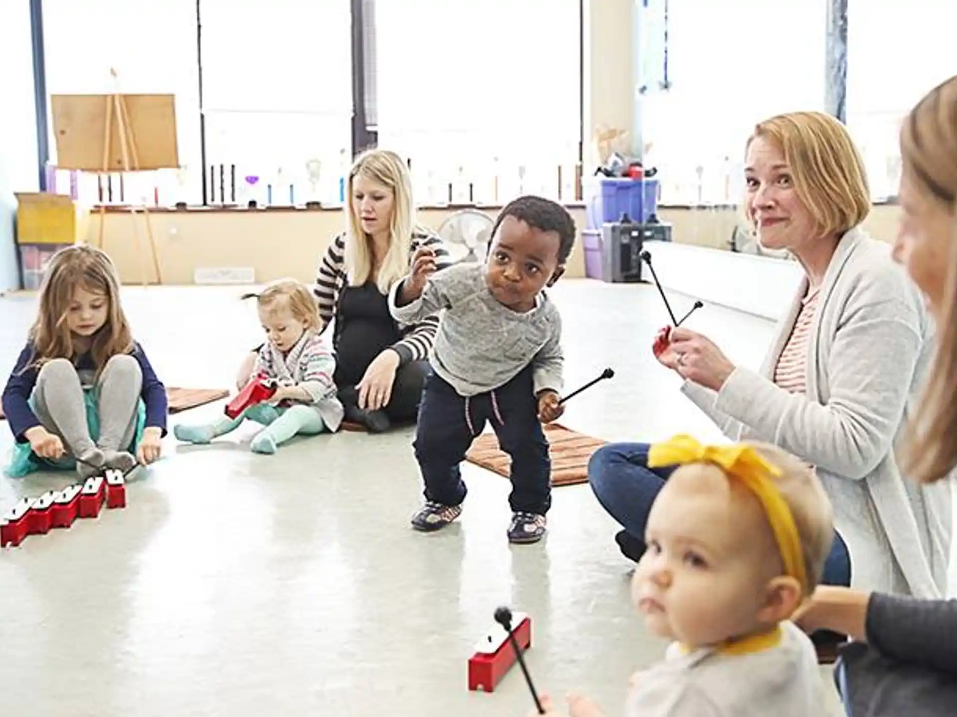 a group of children playing with toys