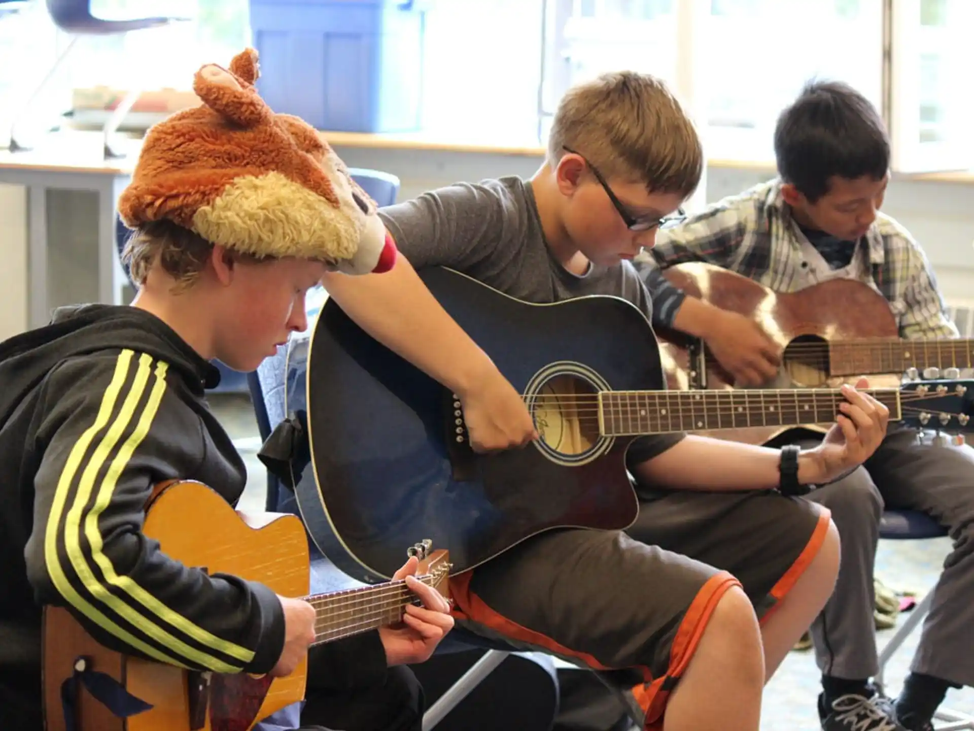 a group of people playing instruments