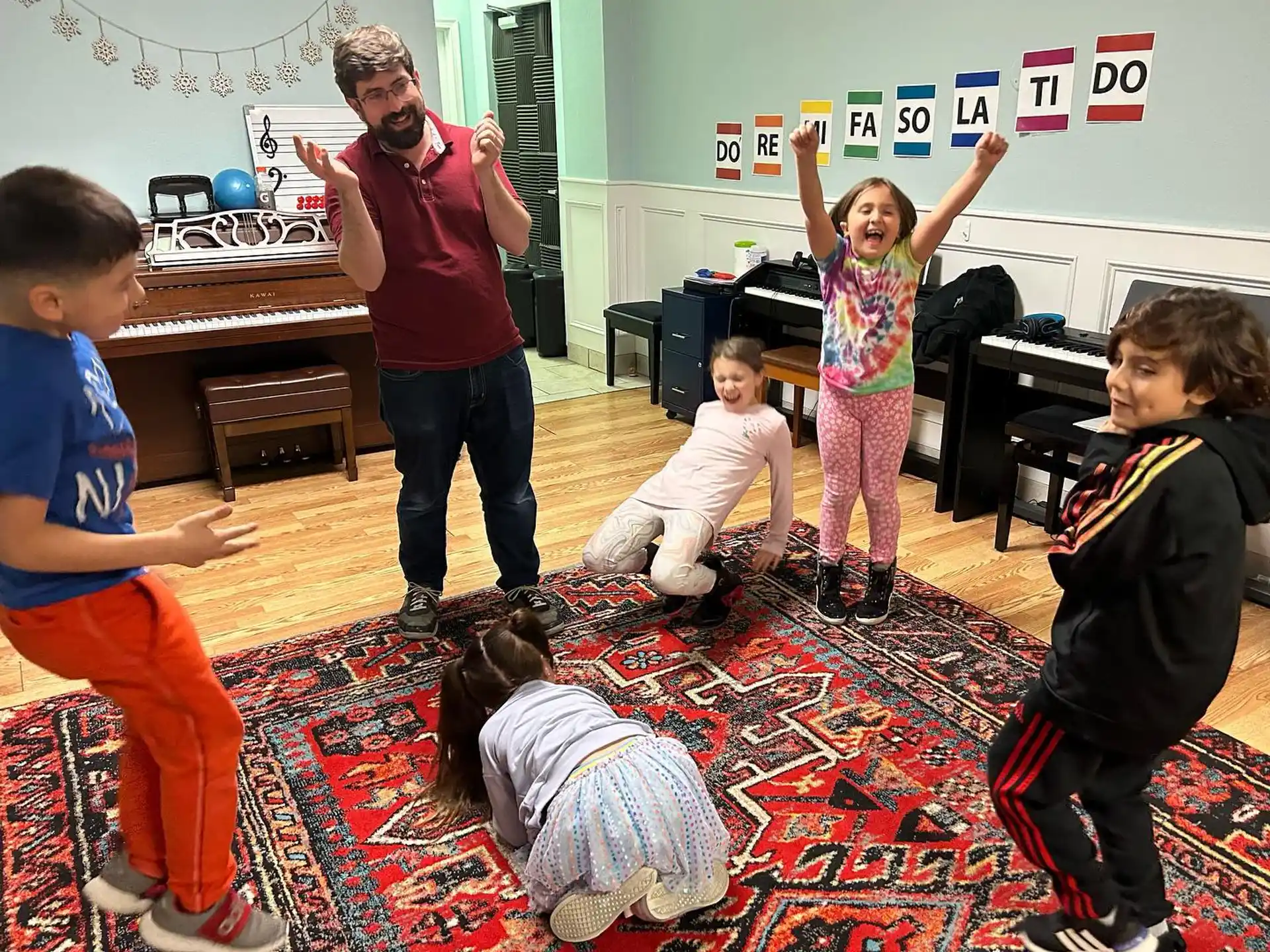 a group of children playing in a classroom