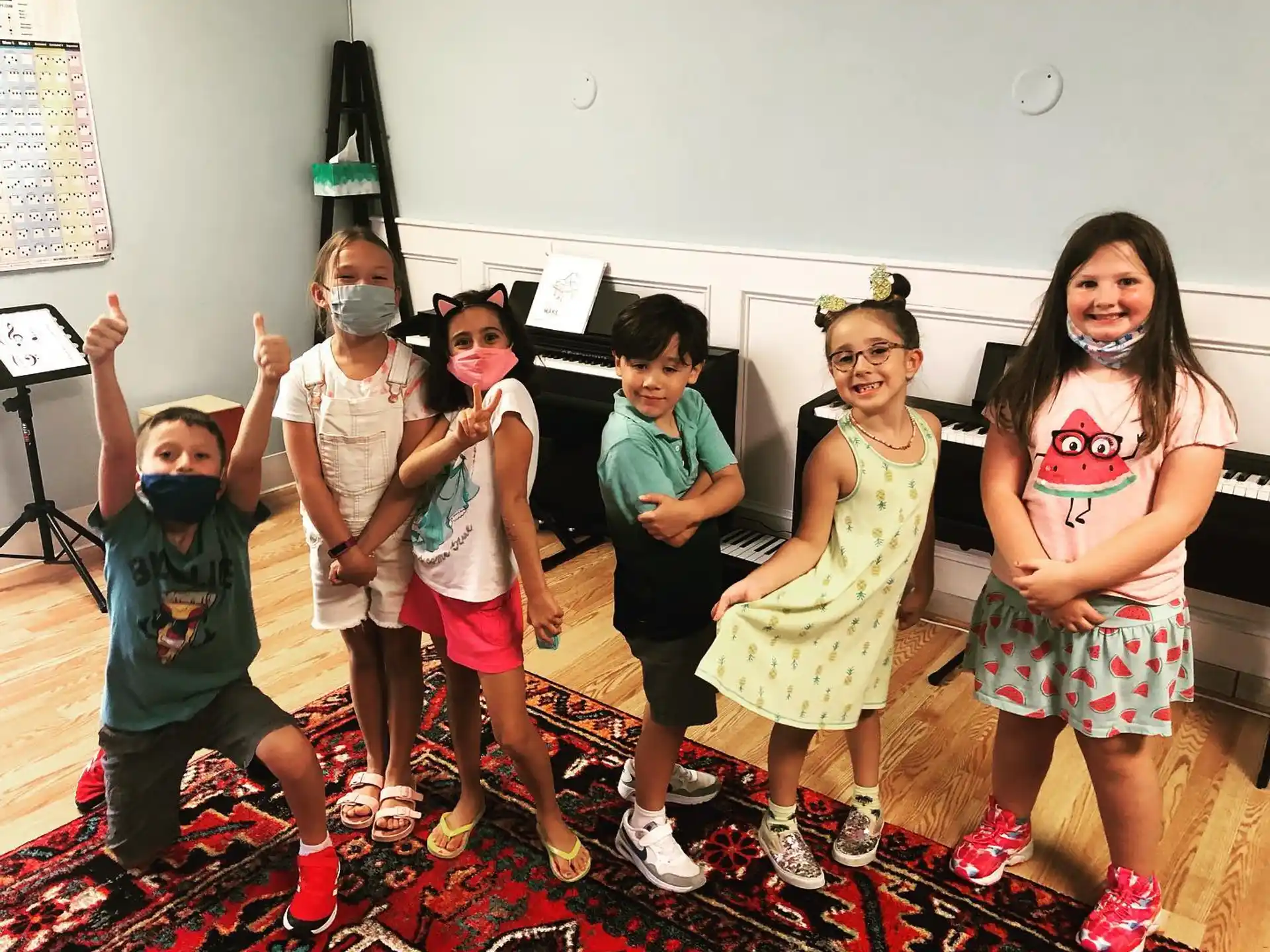 a group of children posing for a photo