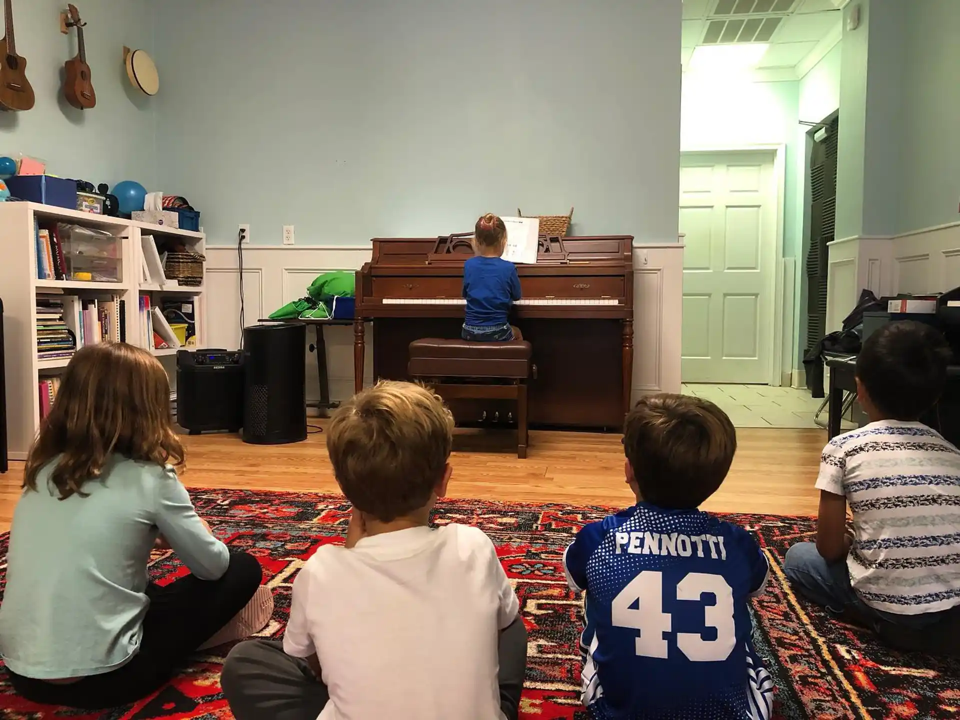 a group of people sitting in a room