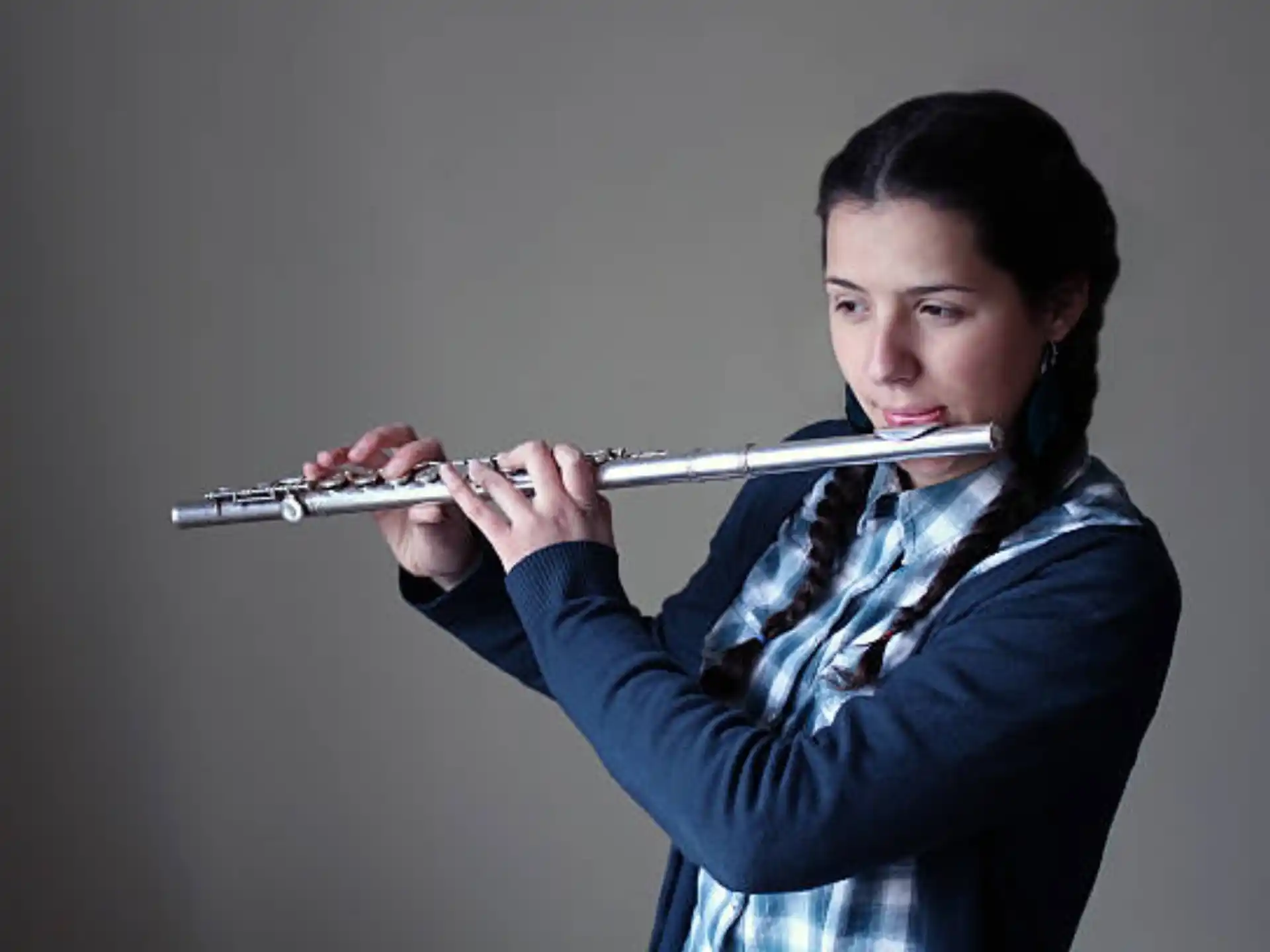 a person playing a flute
