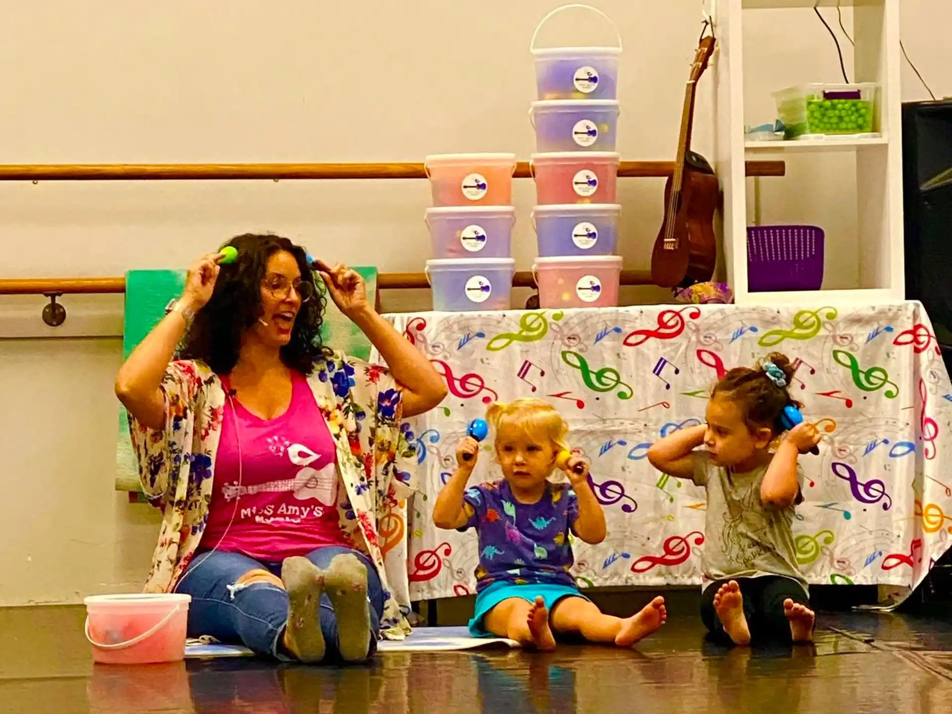 a group of children sitting on the floor