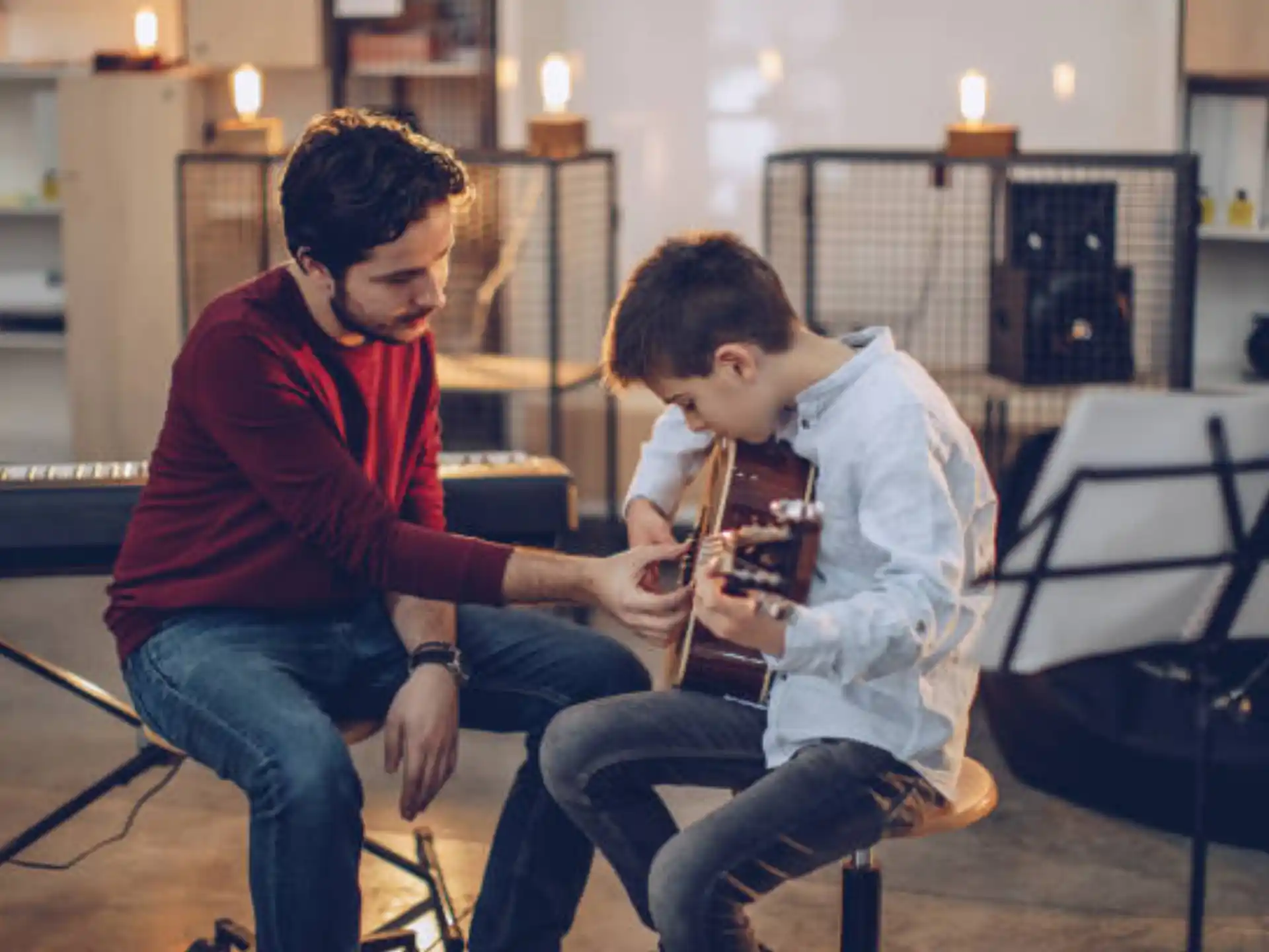 a couple of men playing musical instruments