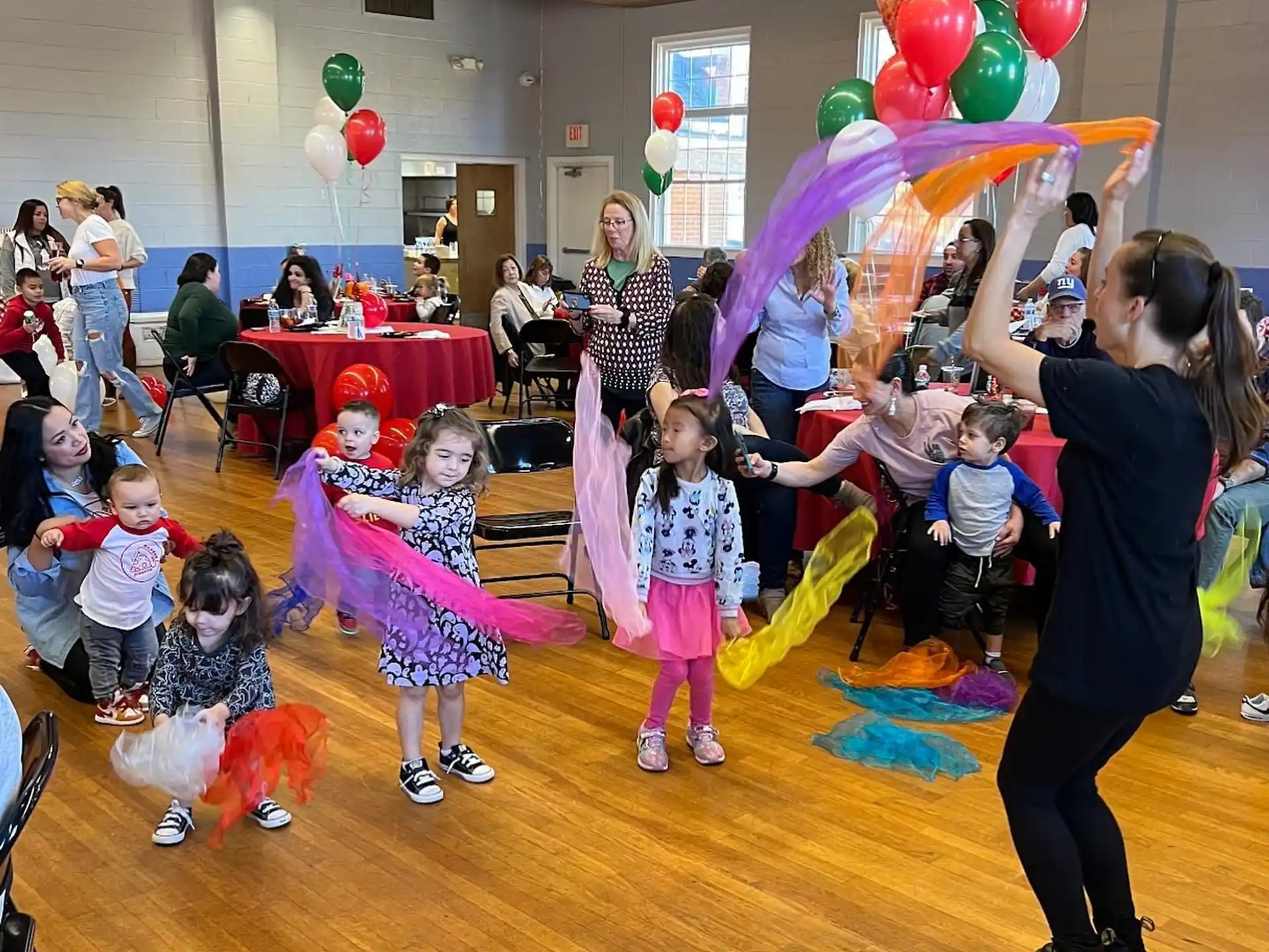 a group of people holding balloons