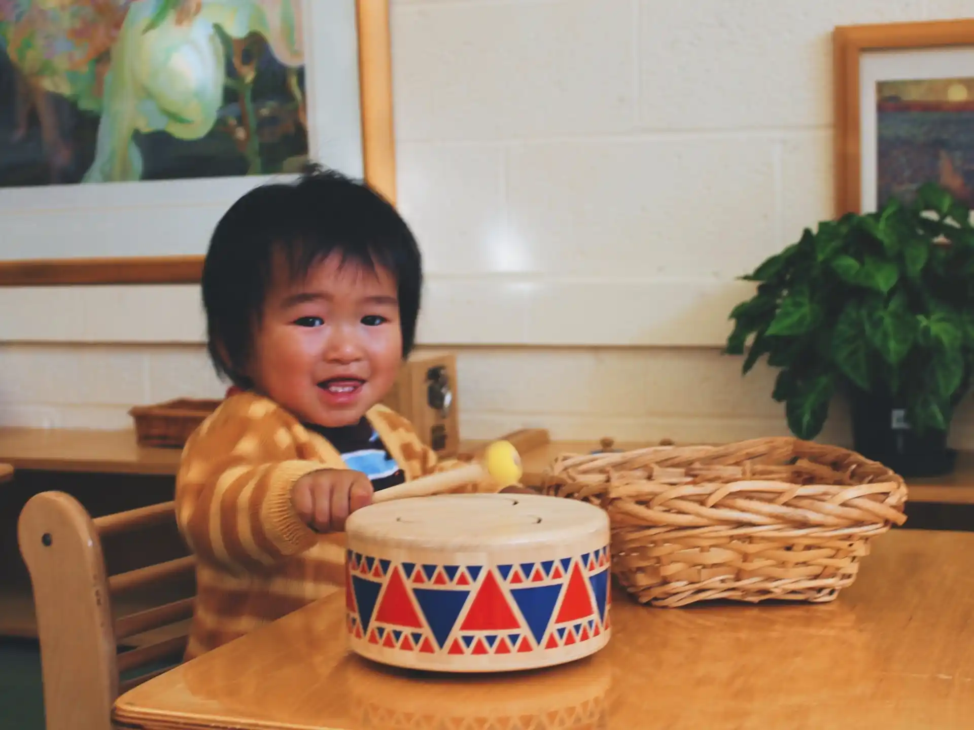 a child sitting at a table