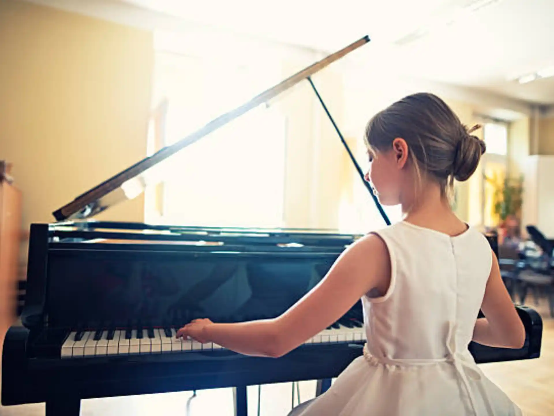 a person playing a piano
