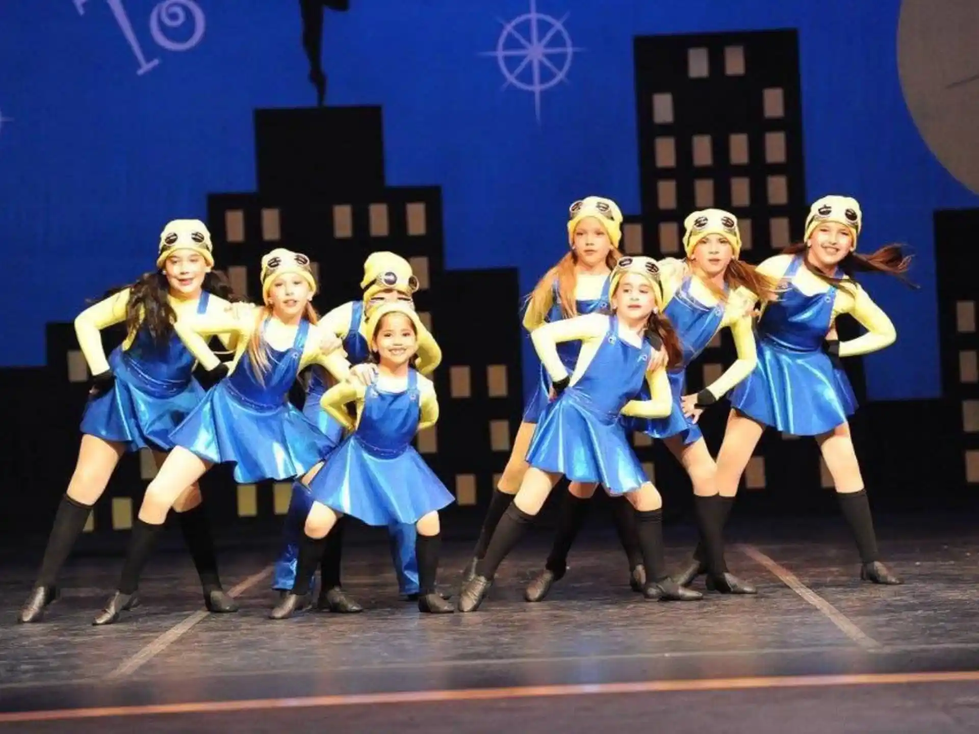 a group of cheerleaders on a stage