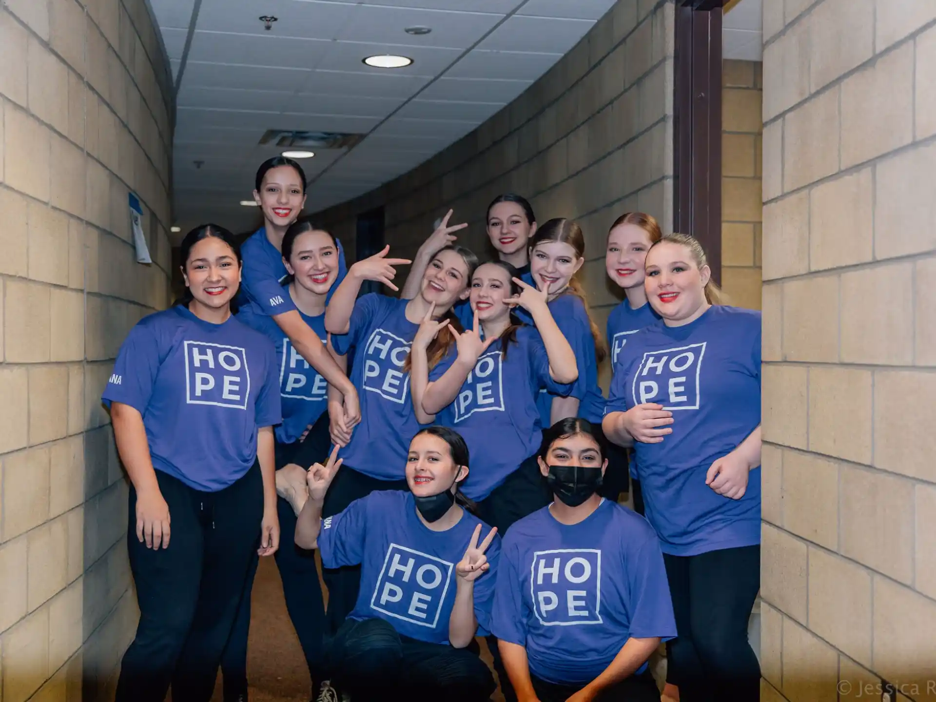 a group of people posing for a photo