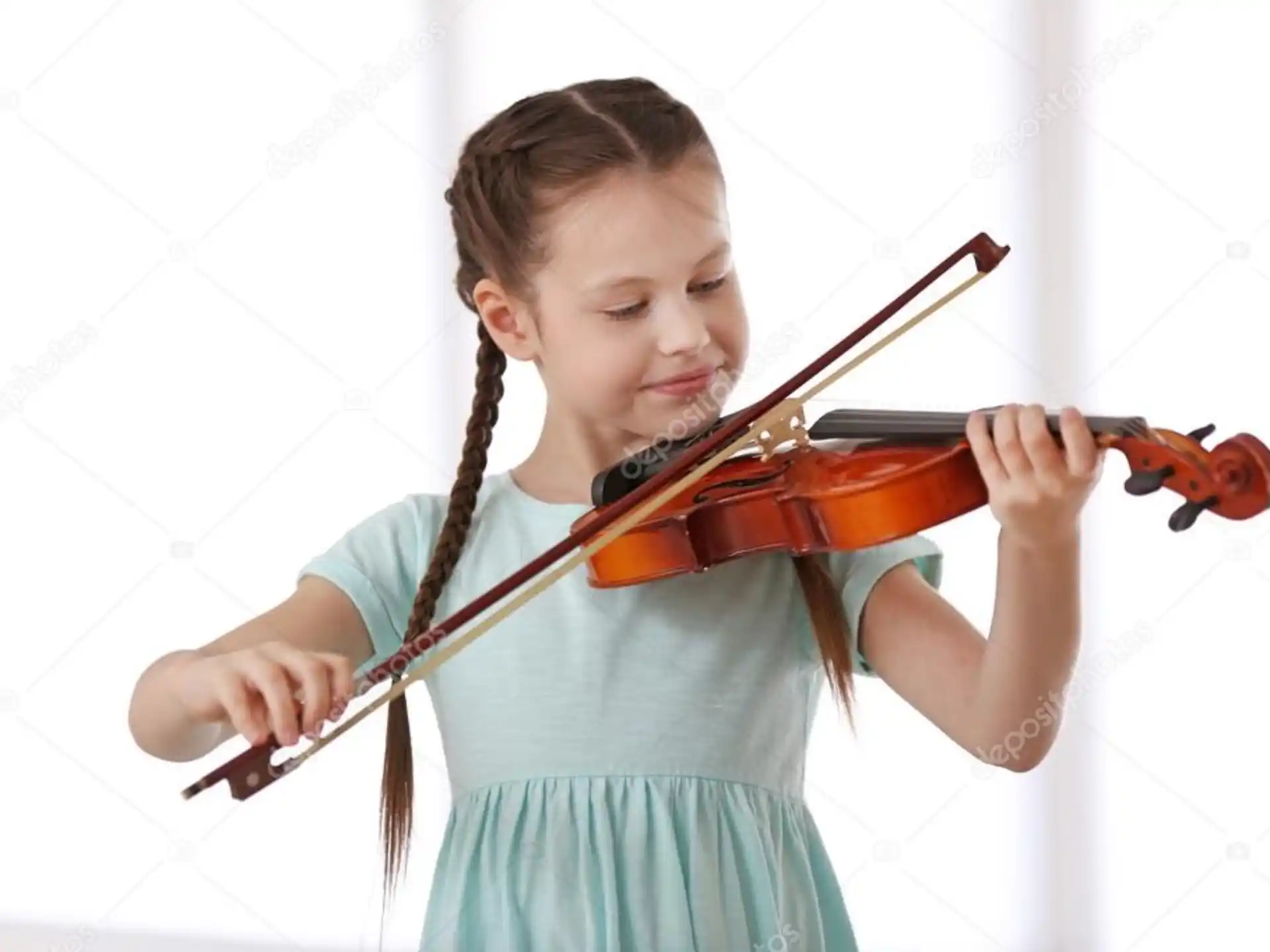 a girl playing a violin