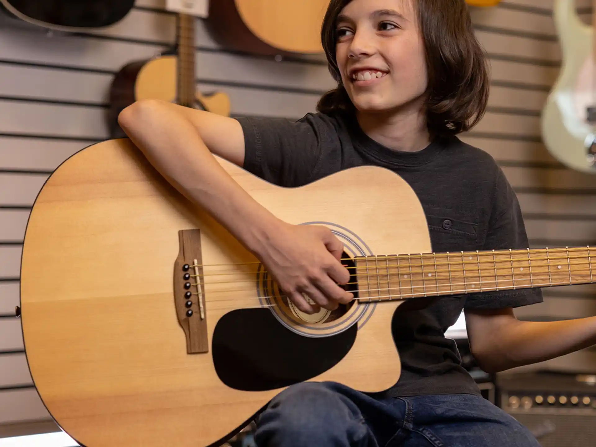 a person playing a guitar