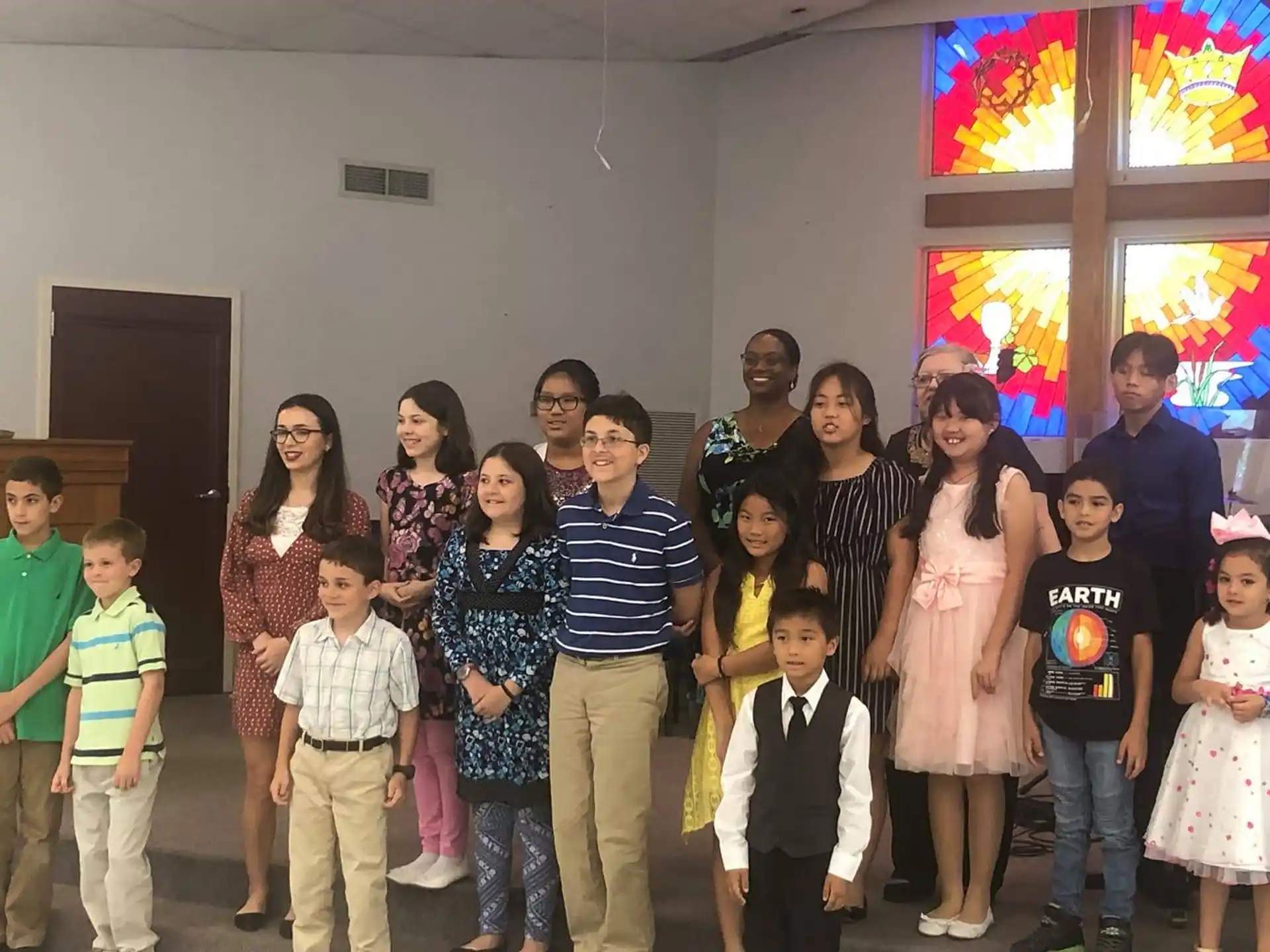 a group of people posing for a photo