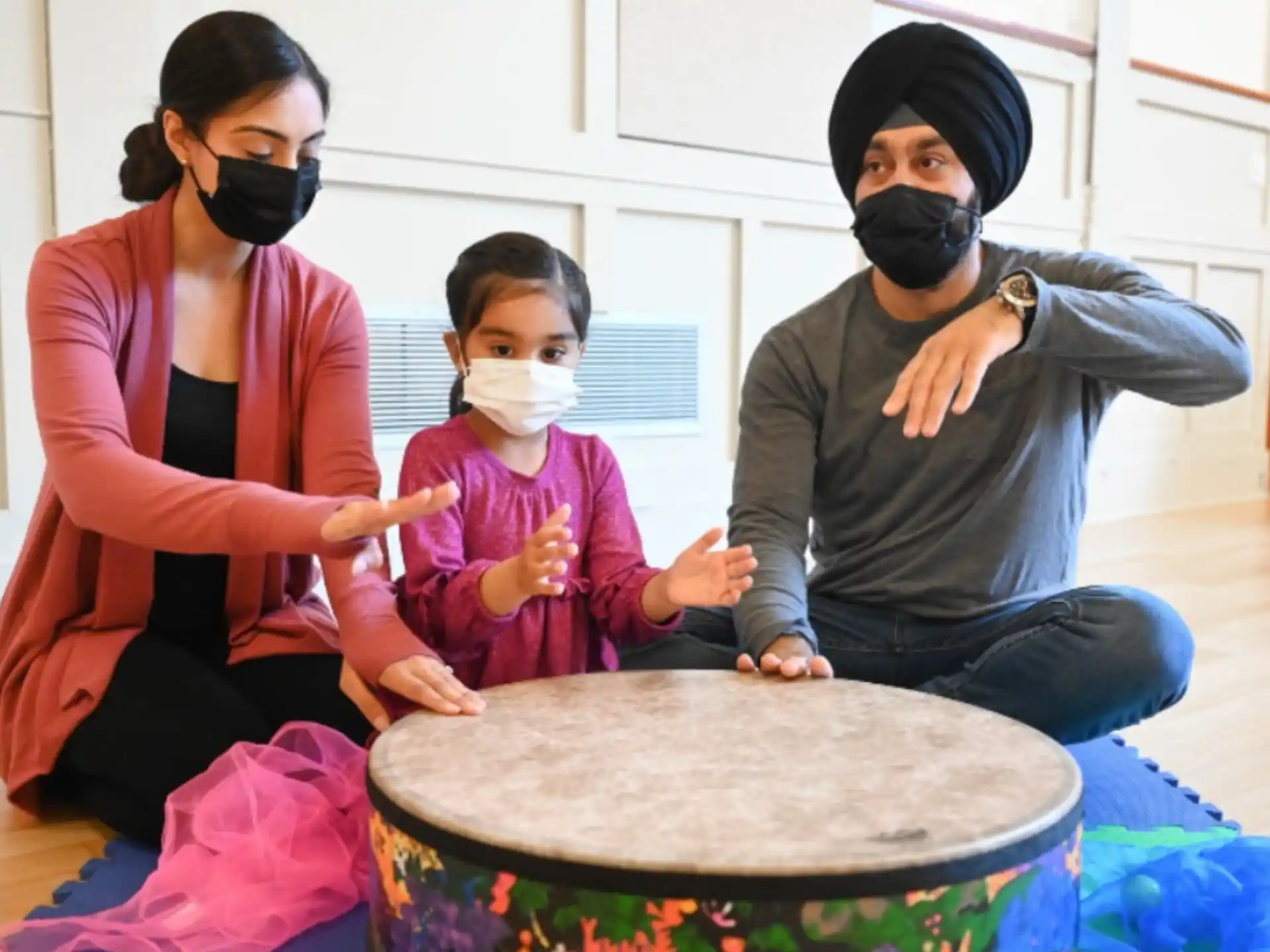 a group of people wearing masks