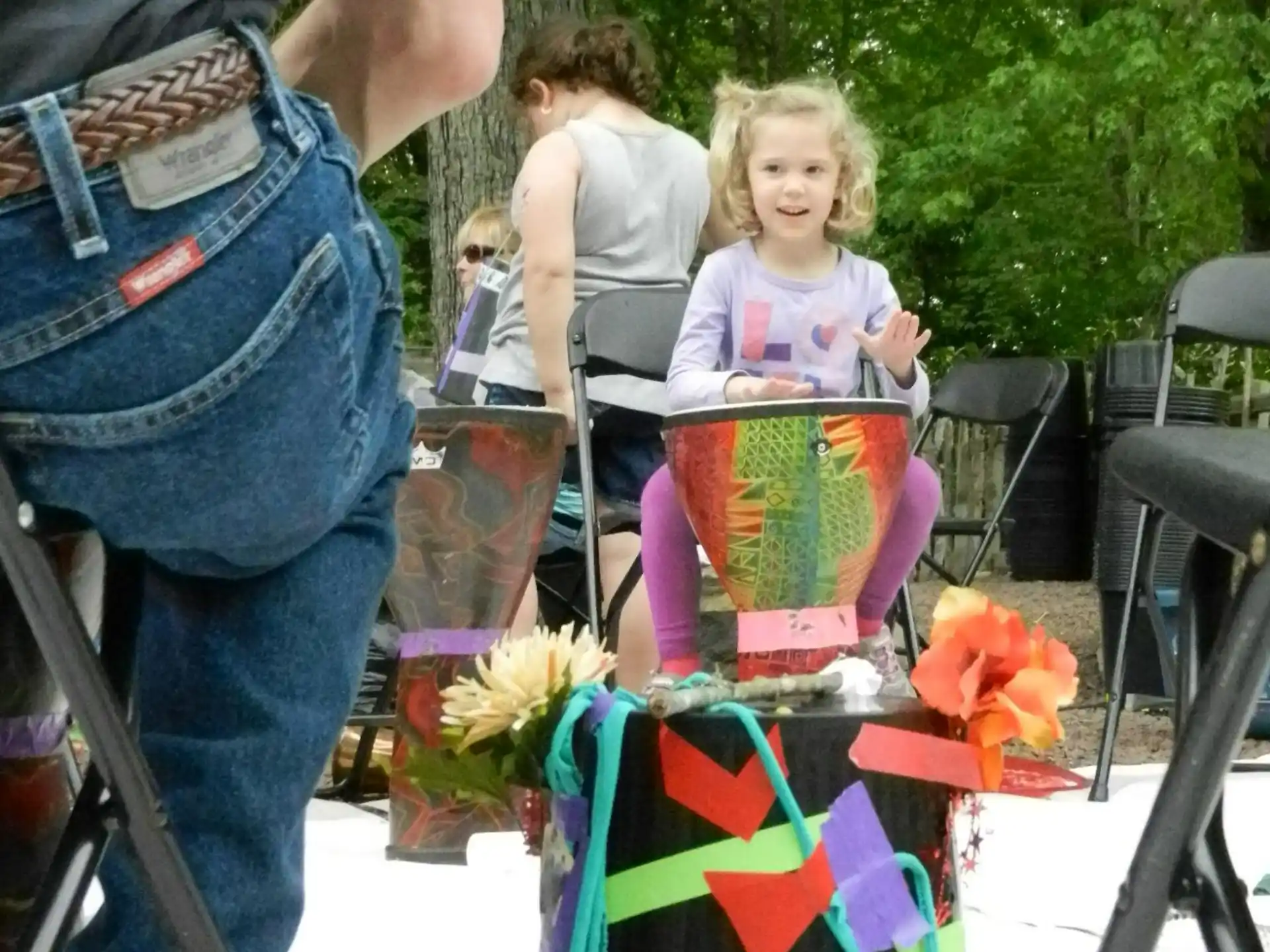 a girl sitting in a chair