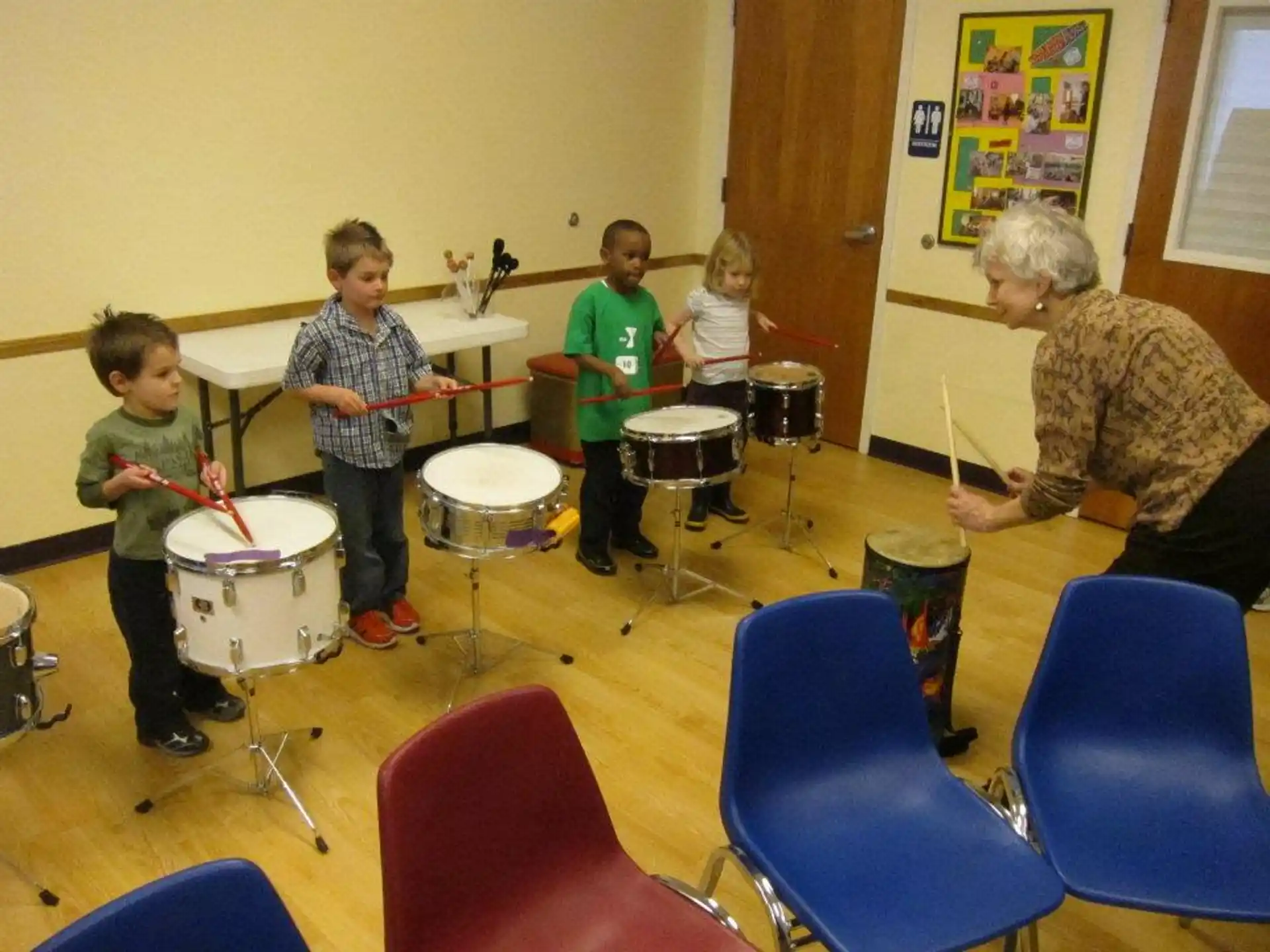 a group of people playing drums