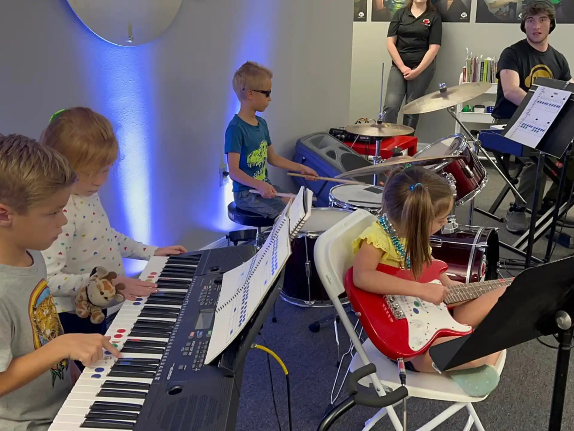 a group of people playing musical instruments