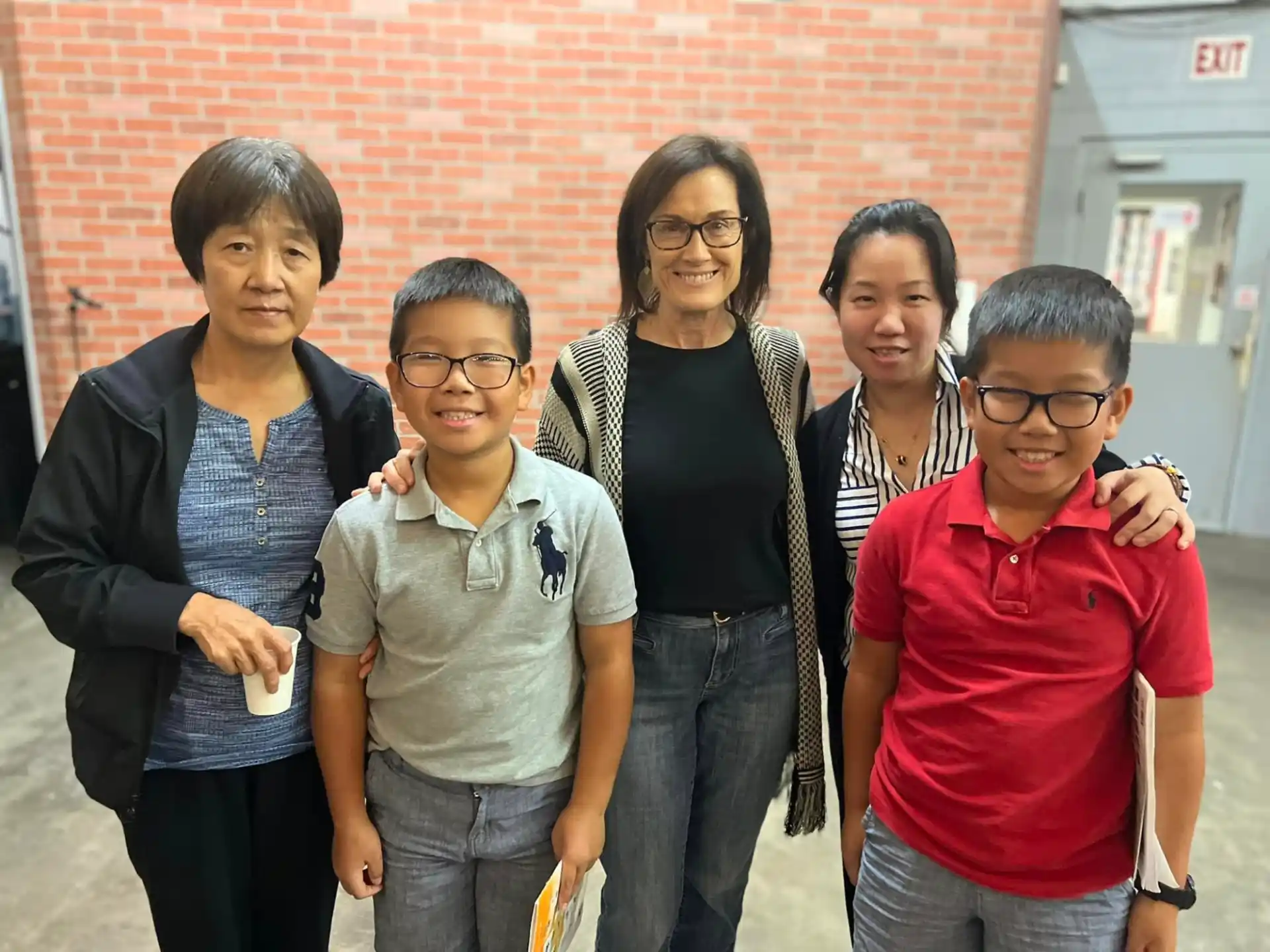 a group of people posing for a photo