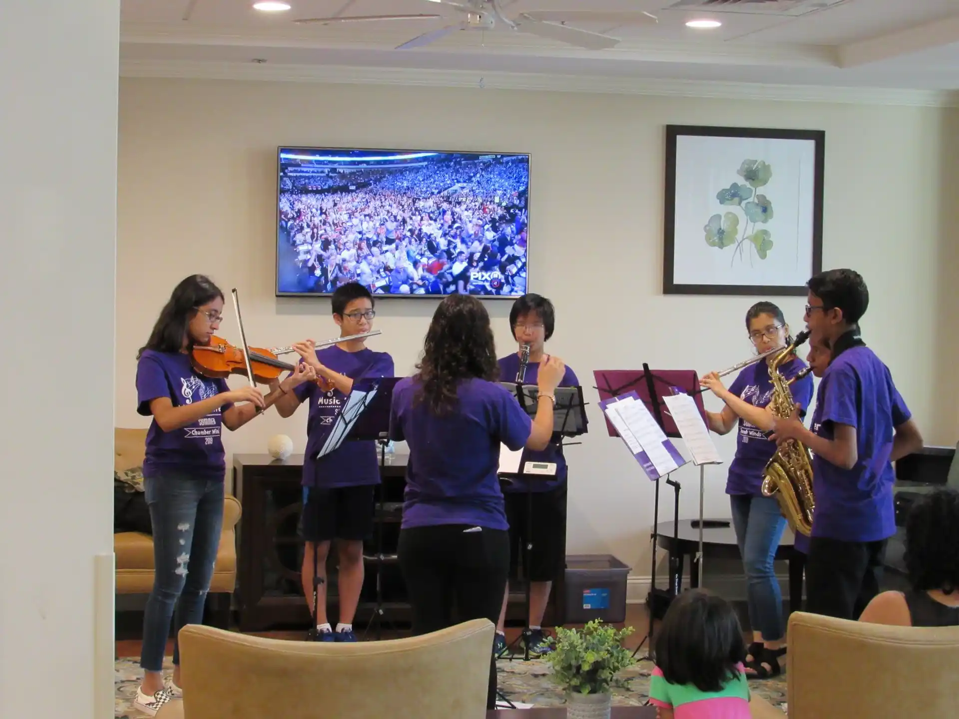 a group of people playing instruments
