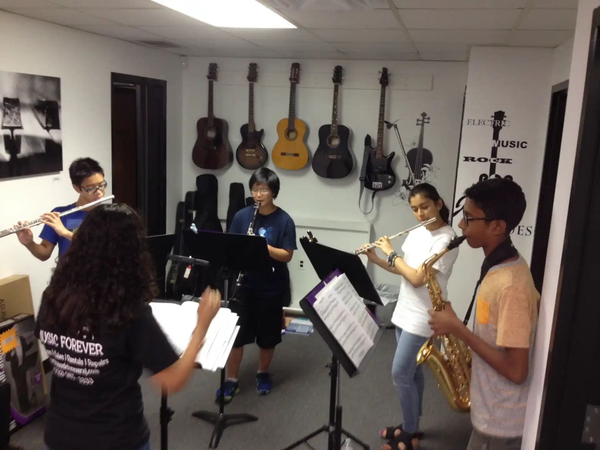 a group of people playing instruments