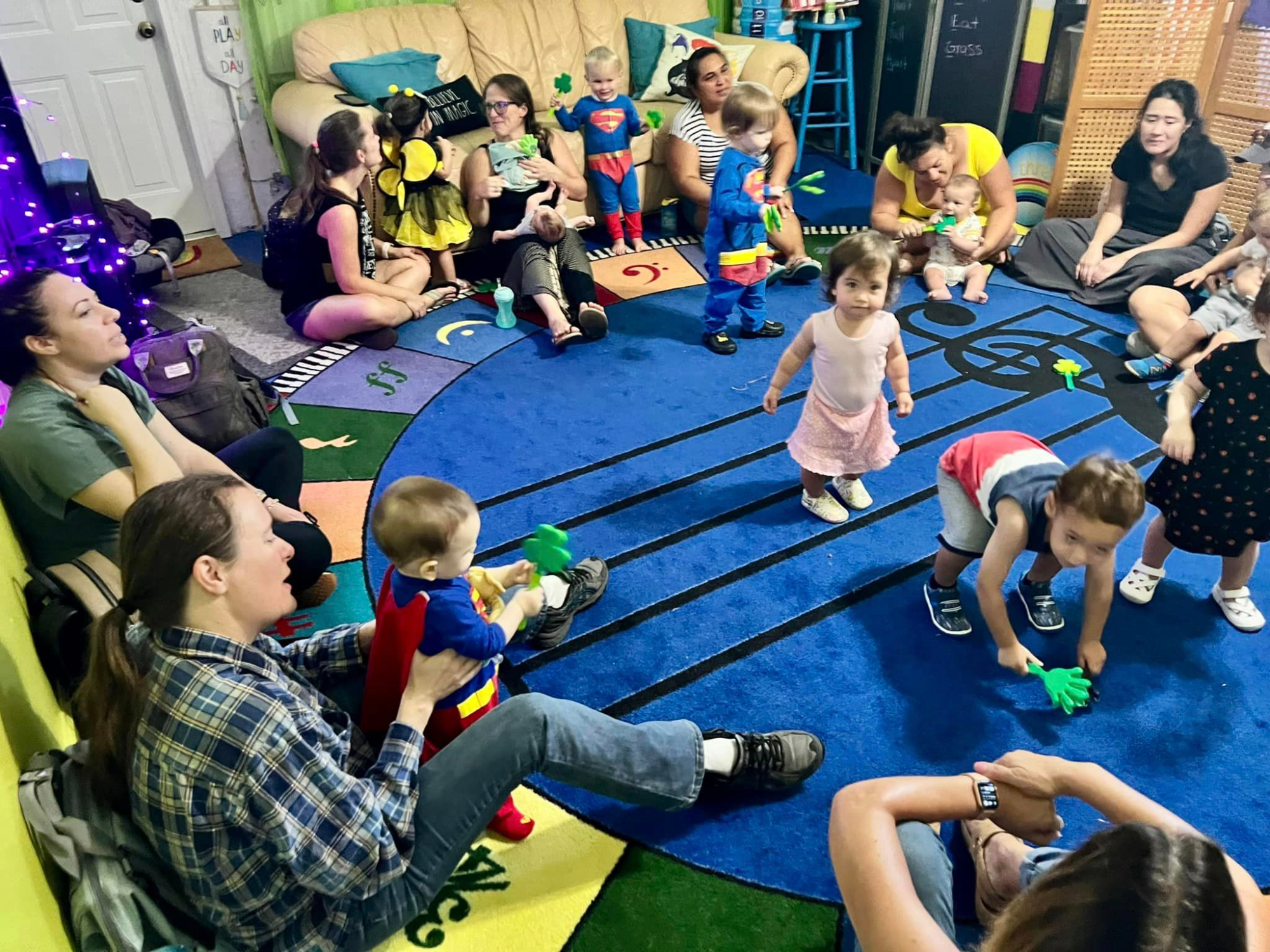 a group of people sitting on the floor
