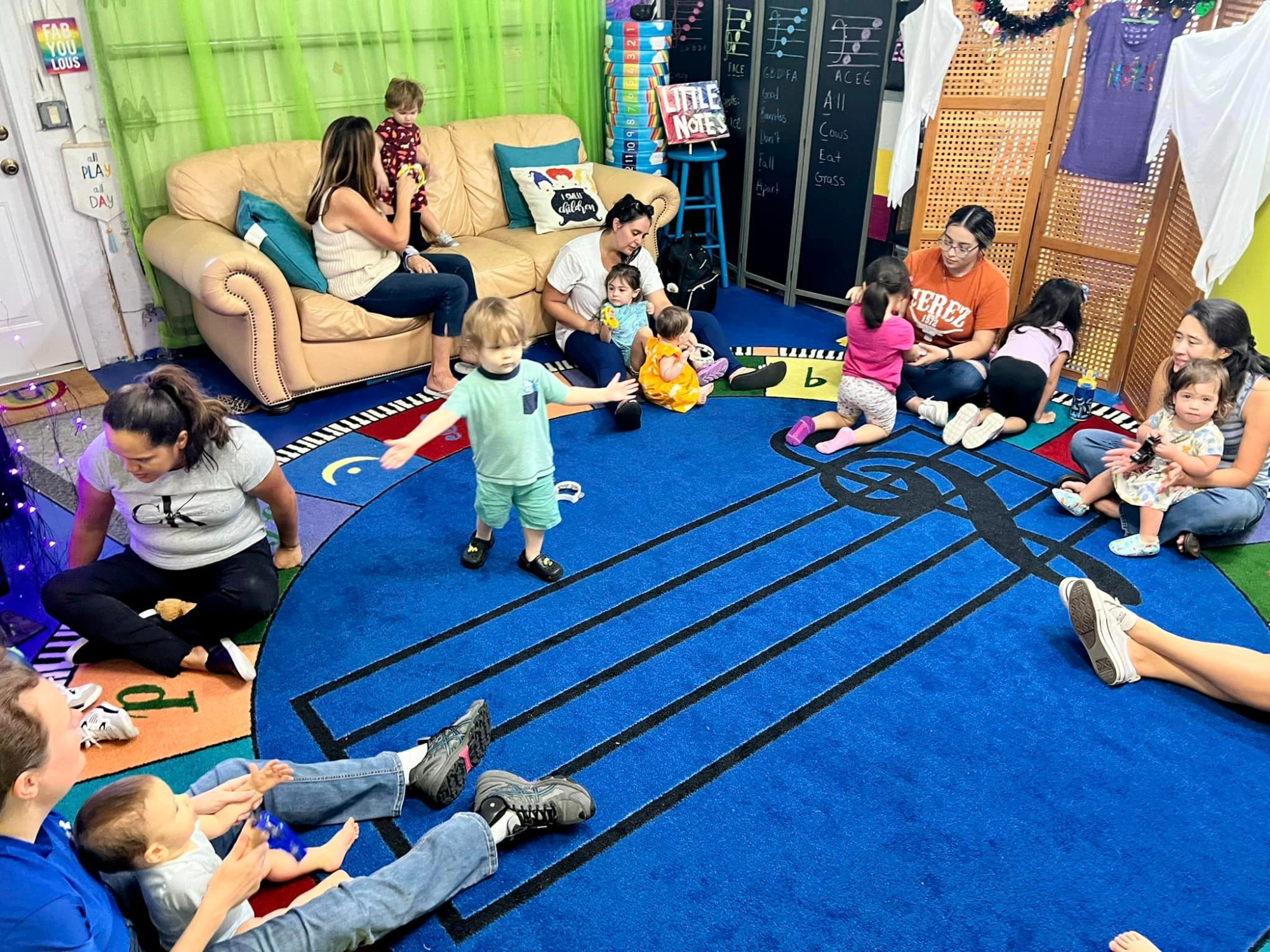 a group of people sitting on the floor
