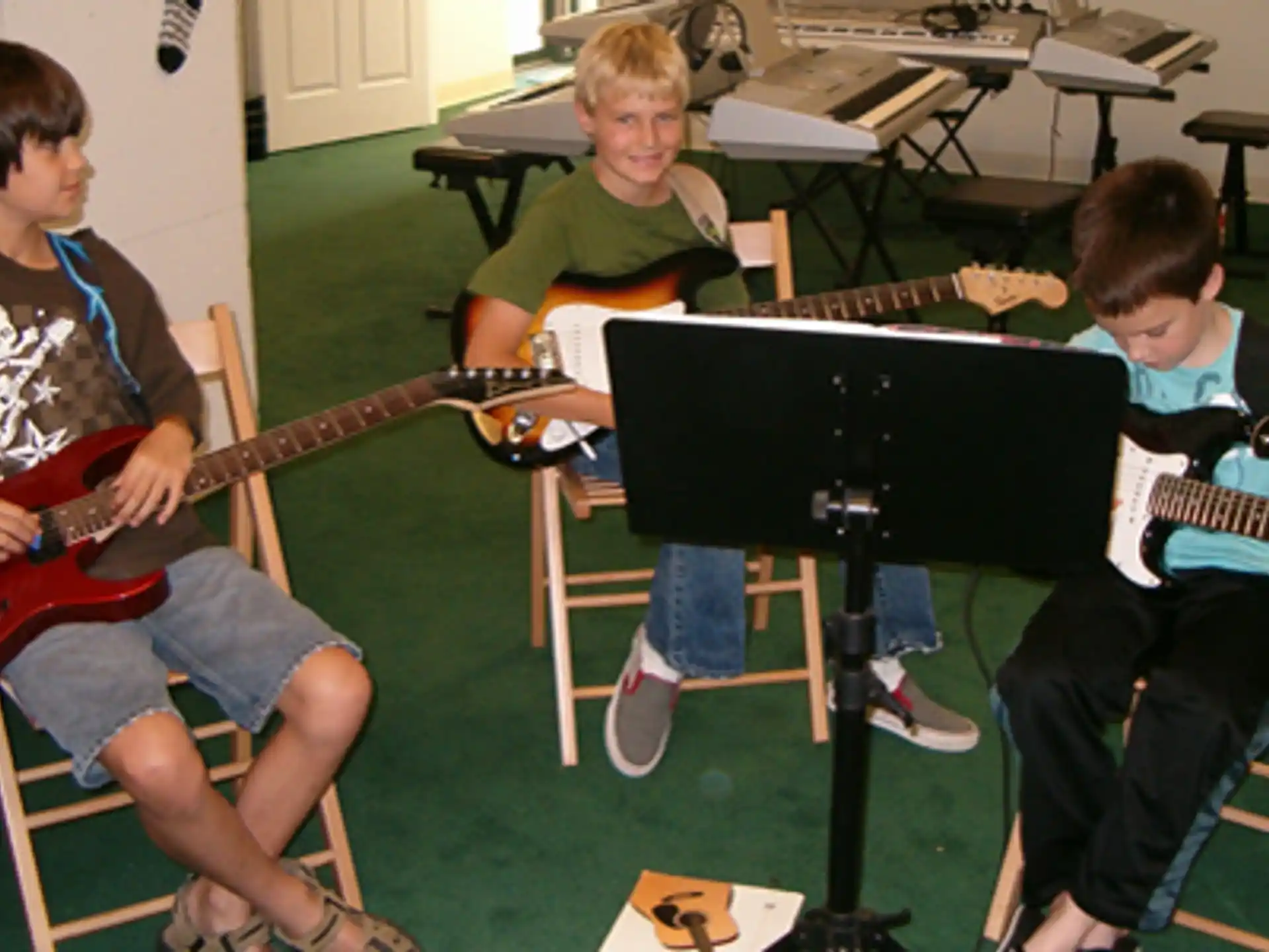 a group of boys playing instruments