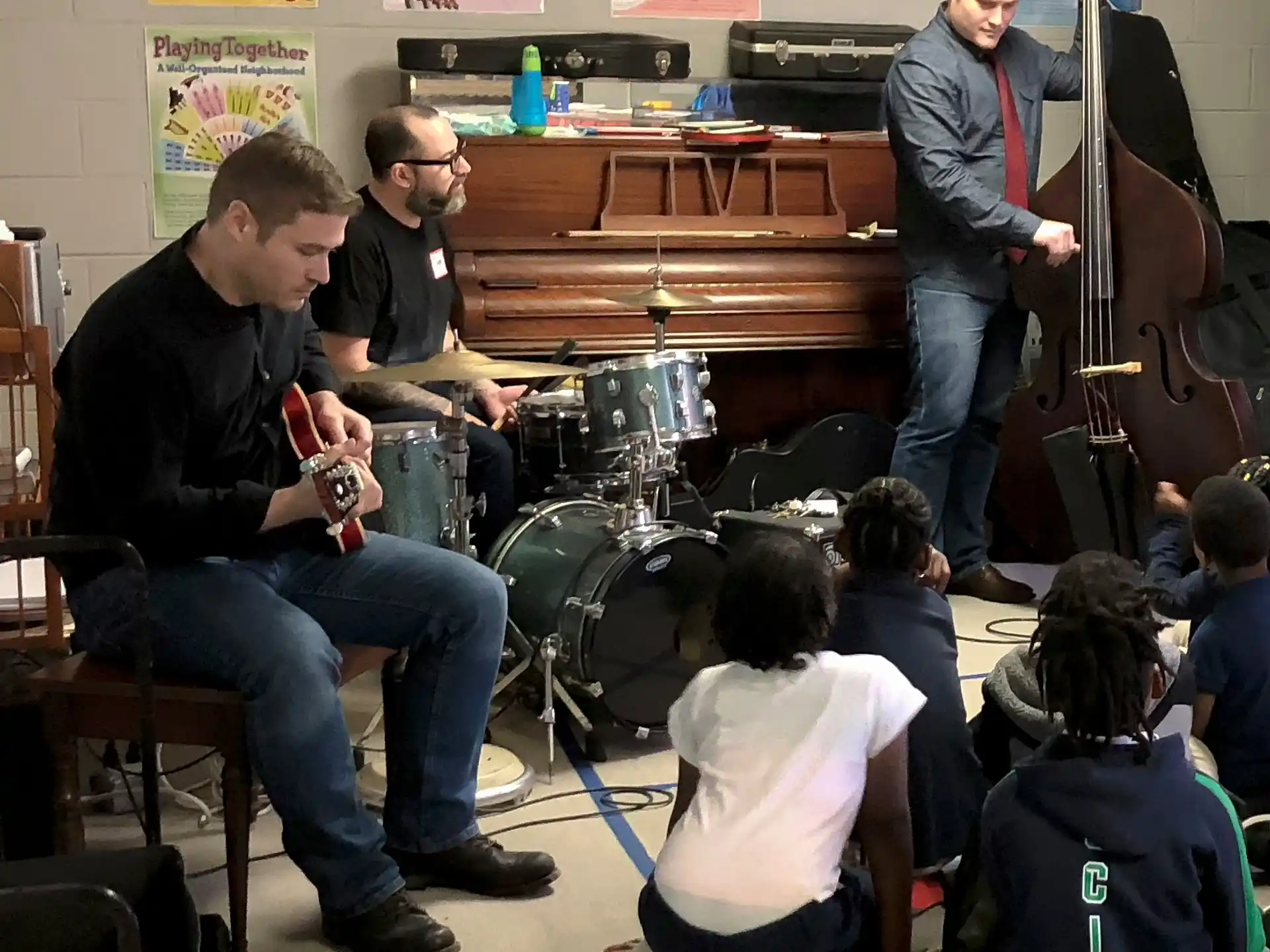 a group of people playing instruments