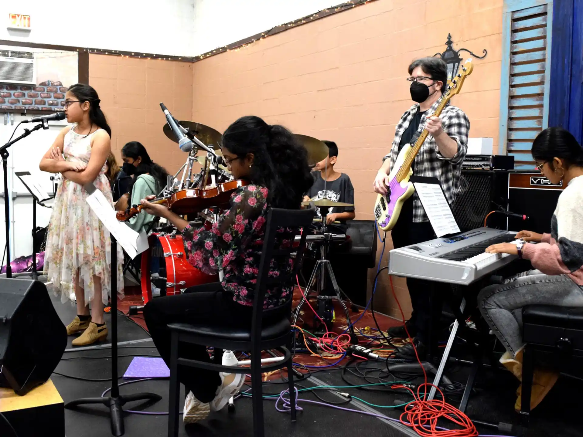 a group of people playing instruments