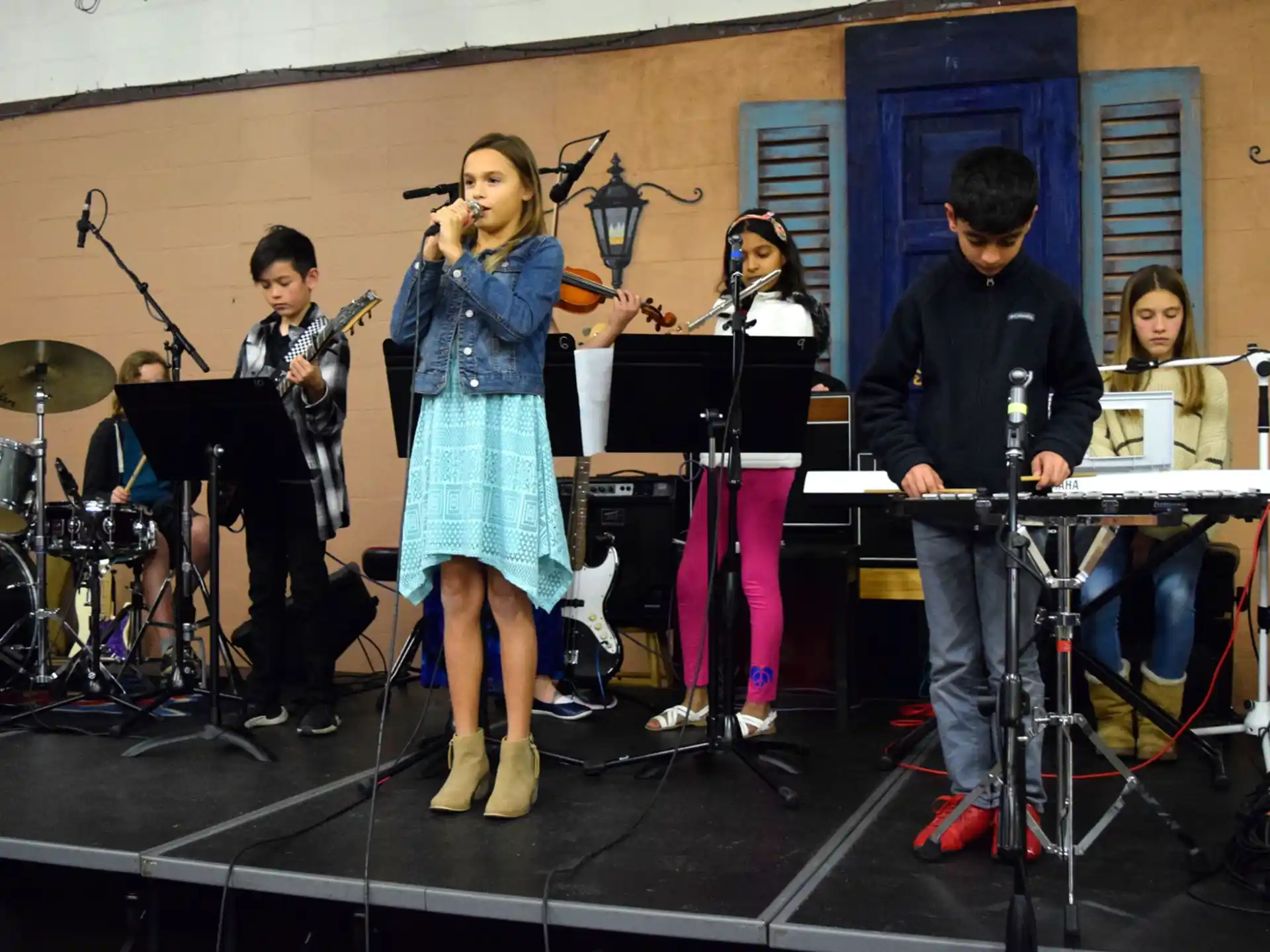 a group of people playing musical instruments