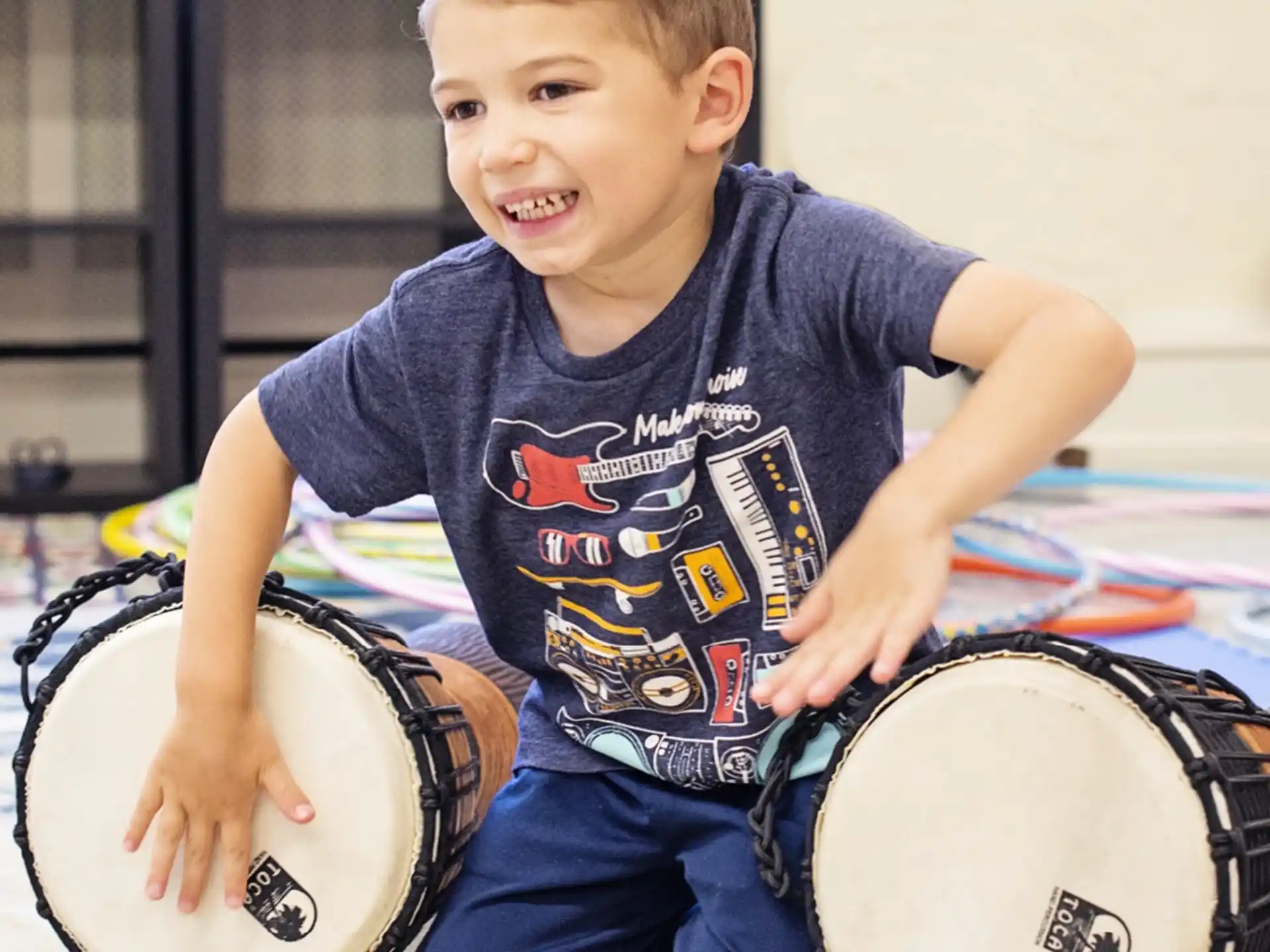 a boy playing drums