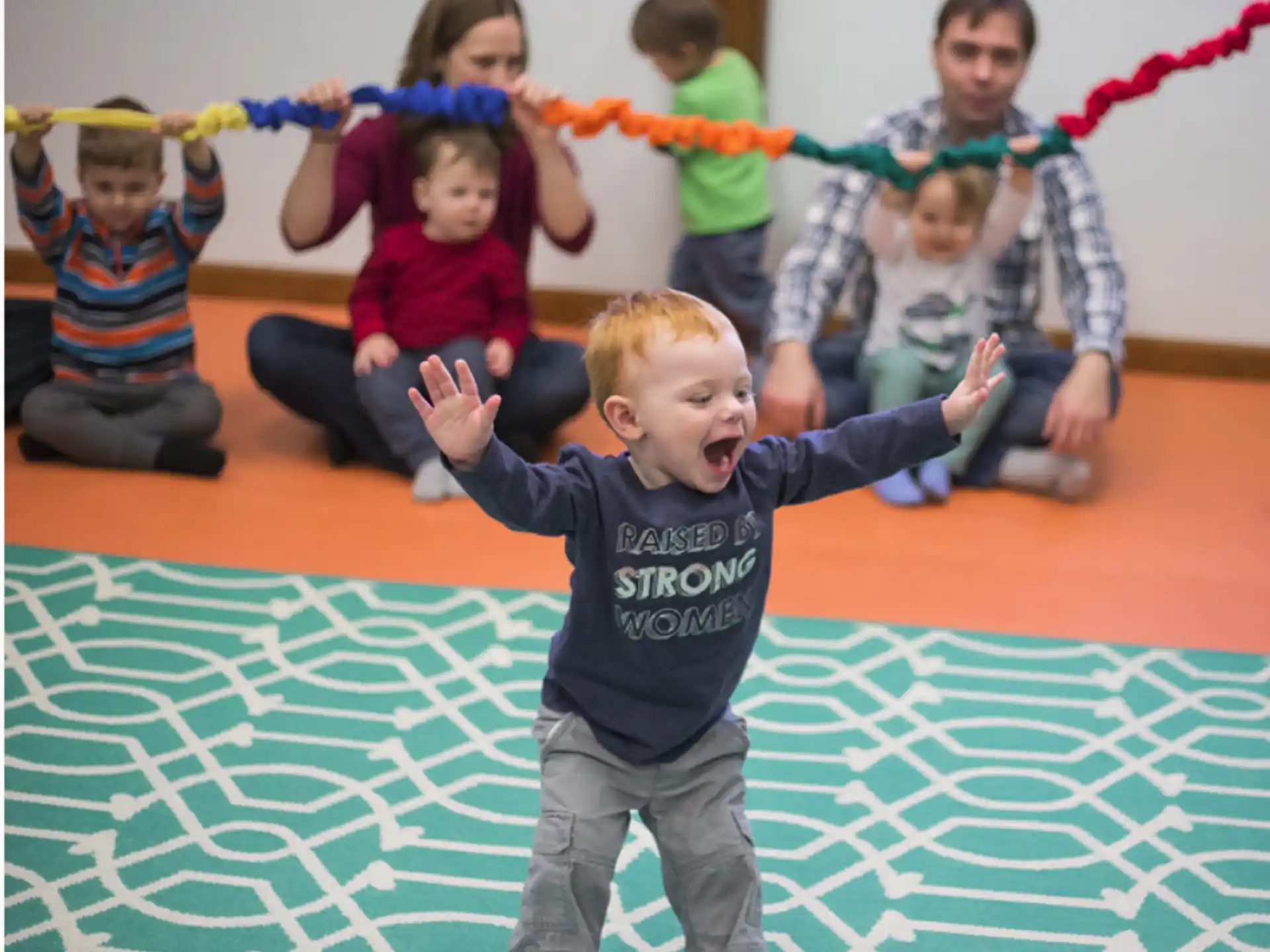 a group of children playing on the floor